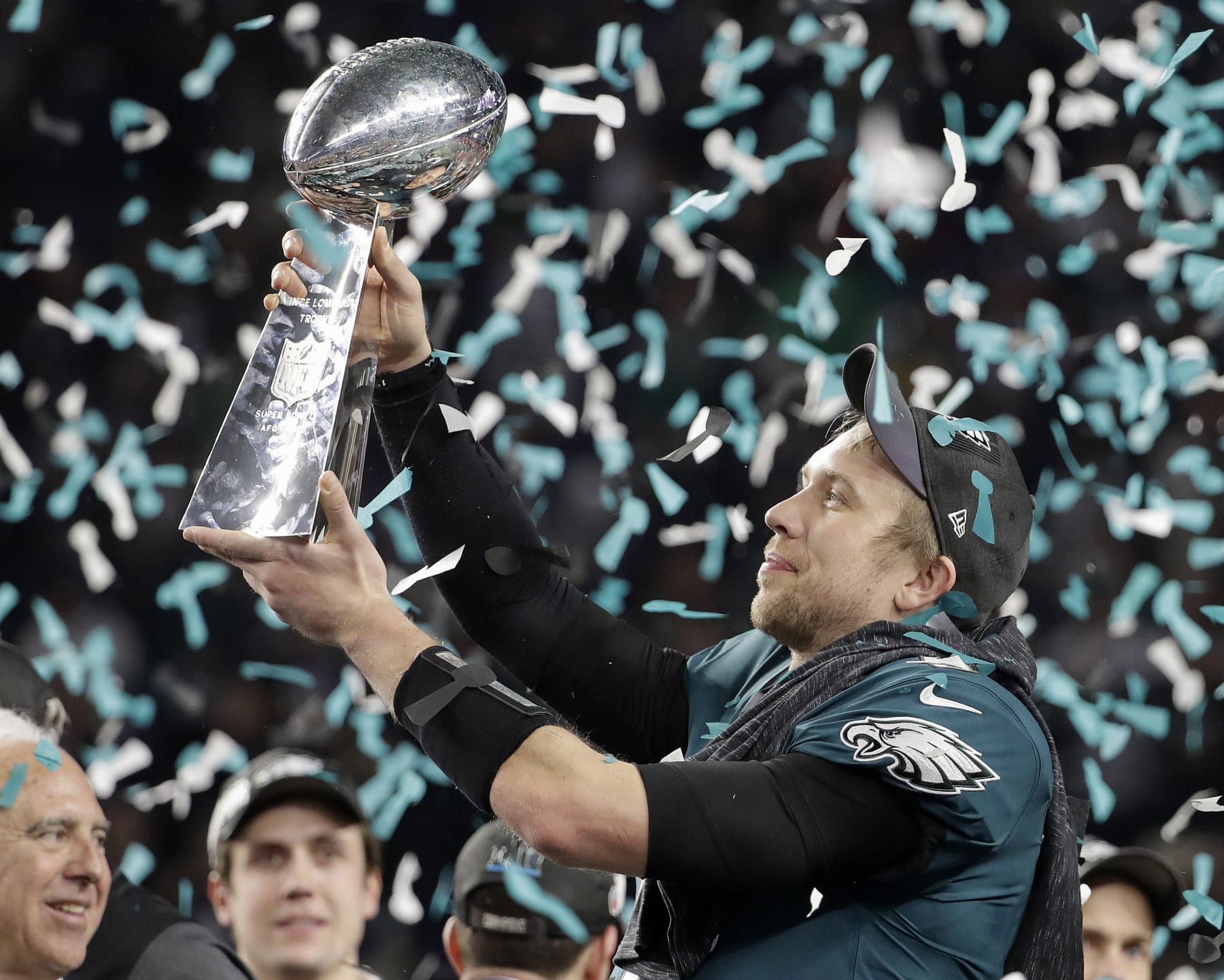 FILE - Philadelphia Eagles' Nick Foles holds up the Vince Lombardi Trophy after the NFL Super Bowl 52 football game against the New England Patriots, Sunday, Feb. 4, 2018, in Minneapolis. The Eagles won 41-33. (AP Photo/Chris O'Meara, File)