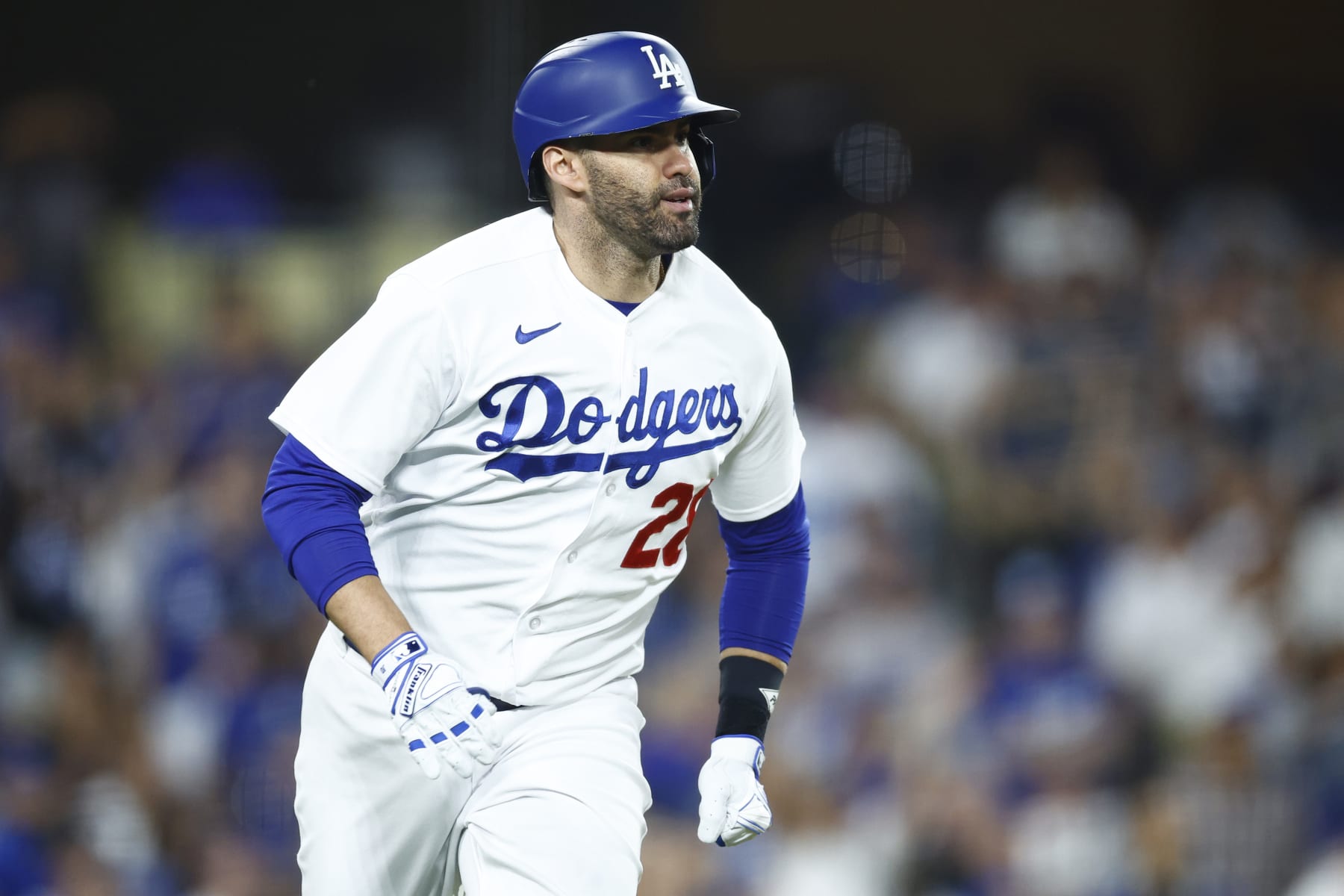 LOS ANGELES, CALIFORNIA - OCTOBER 09: J.D. Martinez #28 of the Los Angeles Dodgers hits a solo home run against the Arizona Diamondbacks during the fourth inning in Game Two of the Division Series at Dodger Stadium on October 09, 2023 in Los Angeles, California. (Photo by Ronald Martinez/Getty Images)