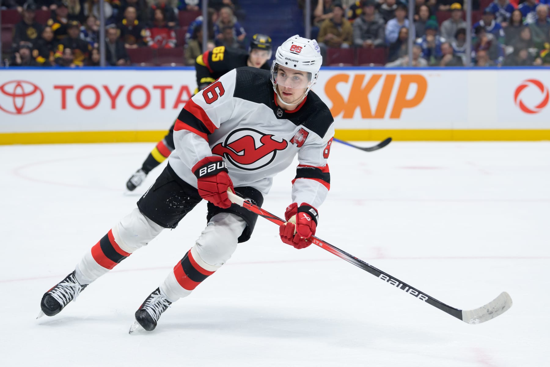 VANCOUVER, CANADA - DECEMBER 5: Jack Hughes #86 of the New Jersey Devils skates during the first period of their NHL game against the Vancouver Canucks at Rogers Arena on December 5, 2023 in Vancouver, British Columbia, Canada. (Photo by Derek Cain/Getty Images)