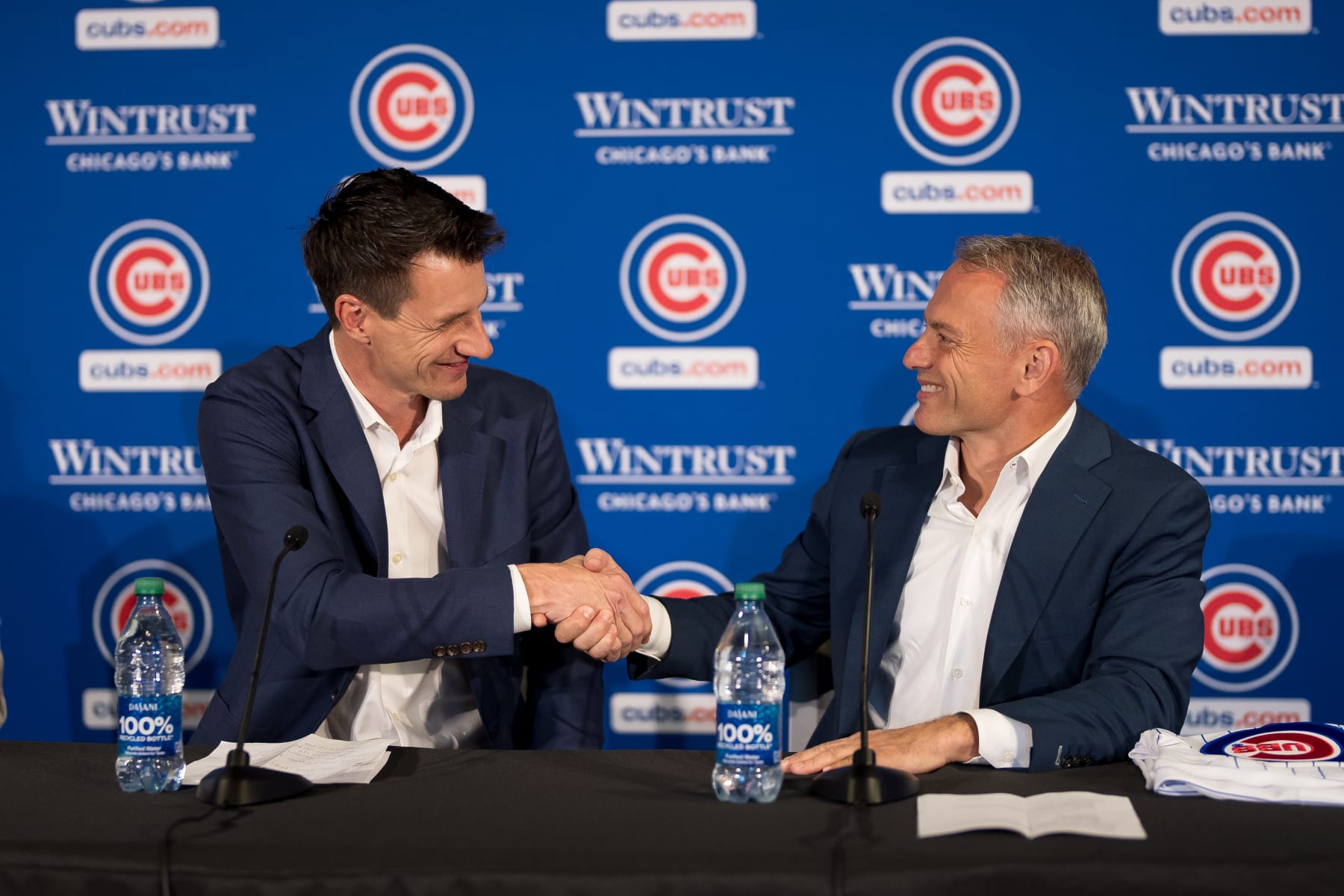 Craig Counsell (L) and Jed Hoyer (R)