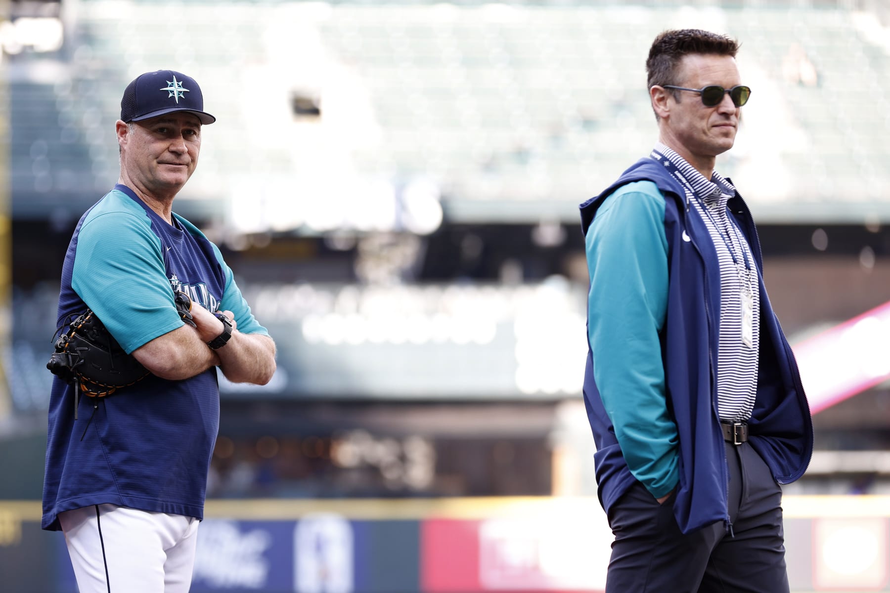 Scott Servais (L) and Jerry Dipoto (R)