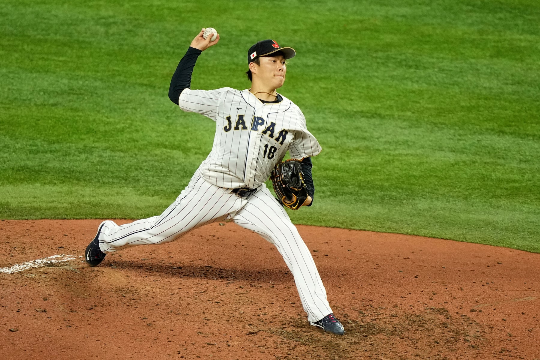 MIAMI, FLORIDA - MARCH 20: Yoshinobu Yamamoto #18 of Team Japan delivers a pitch against Team Mexico during the fifth inning during the World Baseball Classic Semifinals at loanDepot park on March 20, 2023 in Miami, Florida. (Photo by Eric Espada/Getty Images)