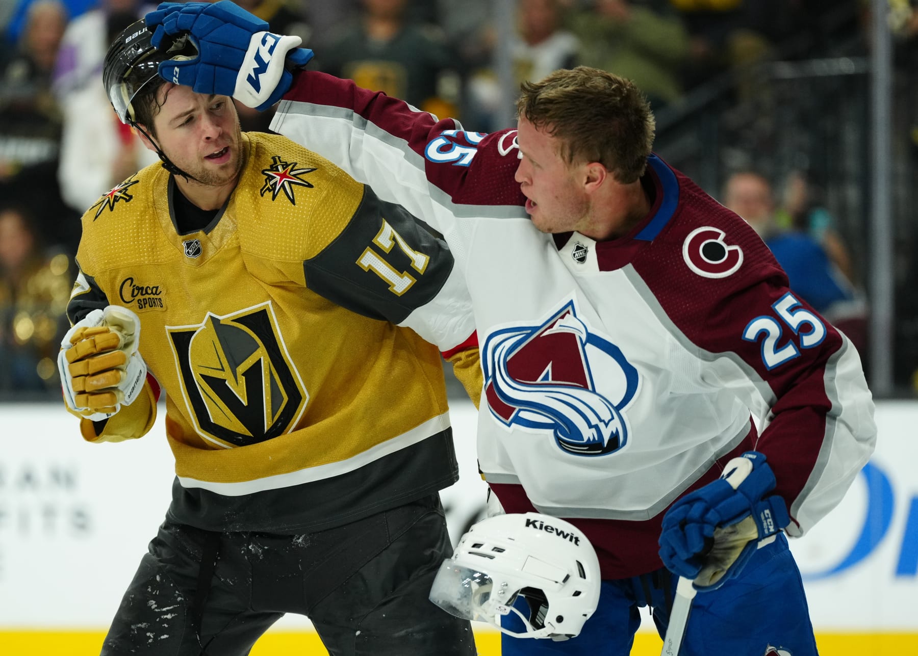 LAS VEGAS, NEVADA - NOVEMBER 04: Logan O'Connor #25 of the Colorado Avalanche fights Ben Hutton #17 of the Vegas Golden Knights during the second period at T-Mobile Arena on November 04, 2023 in Las Vegas, Nevada. (Photo by Jeff Bottari/NHLI via Getty Images)