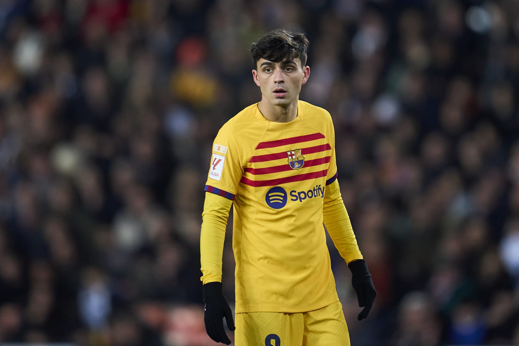 VALENCIA, SPAIN - DECEMBER 16: Pedri of FC Barcelona looks on during the LaLiga EA Sports match between Valencia CF and FC Barcelona at Estadio Mestalla on December 16, 2023 in Valencia, Spain. (Photo by Aitor Alcalde Colomer/Getty Images)