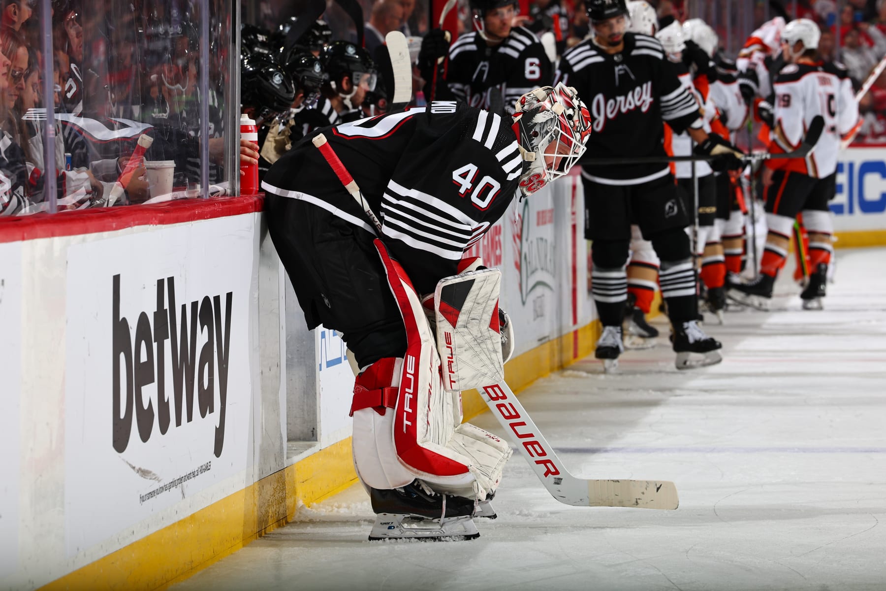 NEWARK, NJ - DECEMBER 17: Akira Schmid #40 of the New Jersey Devils skates in the second period of the game against the Anaheim Ducks at the Prudential Center on December 17, 2023 in Newark, New Jersey. (Photo by Rich Graessle/NHLI via Getty Images)
