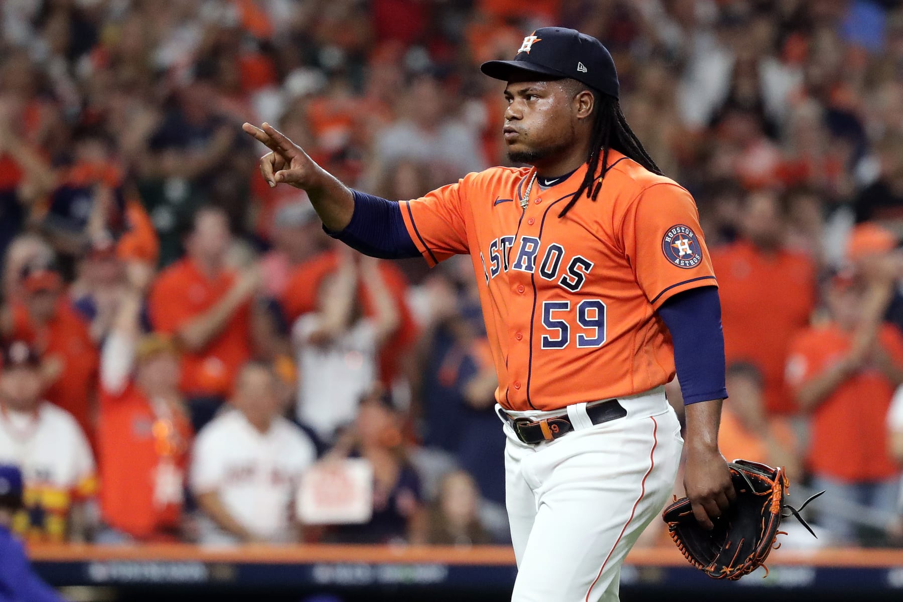 HOUSTON, TEXAS - OCTOBER 22: Framber Valdez #59 of the Houston Astros reacts as he walks back to the dugout after striking out Corey Seager #5 of the Texas Rangers to end the top of the third inning in Game Six of the American League Championship Series at Minute Maid Park on October 22, 2023 in Houston, Texas. (Photo by Bob Levey/Getty Images)