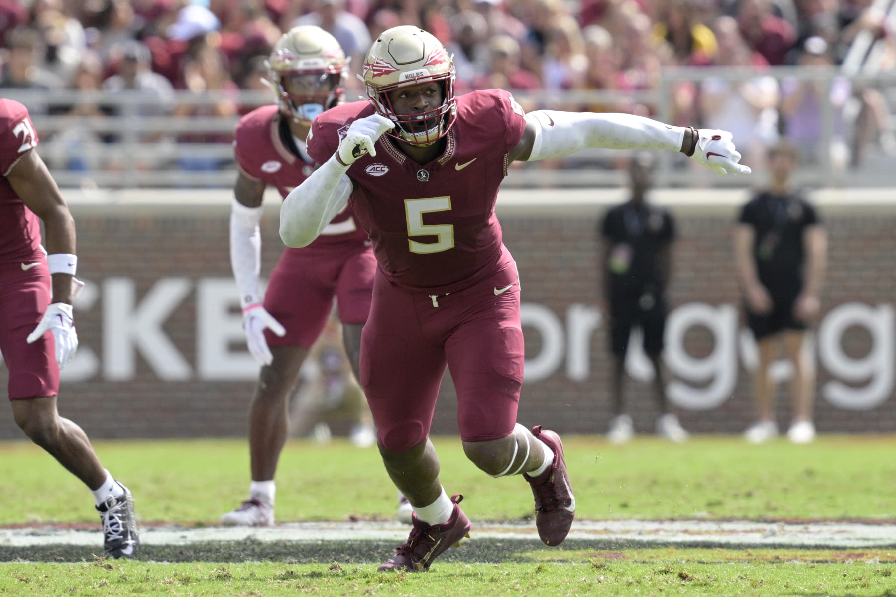 Florida State defensive lineman Jared Verse (5) follows a play against Syracuse during the first half of an NCAA college football game, Saturday, Oct. 14, 2023, in Tallahassee, Fla. (AP Photo/Phelan M. Ebenhack)