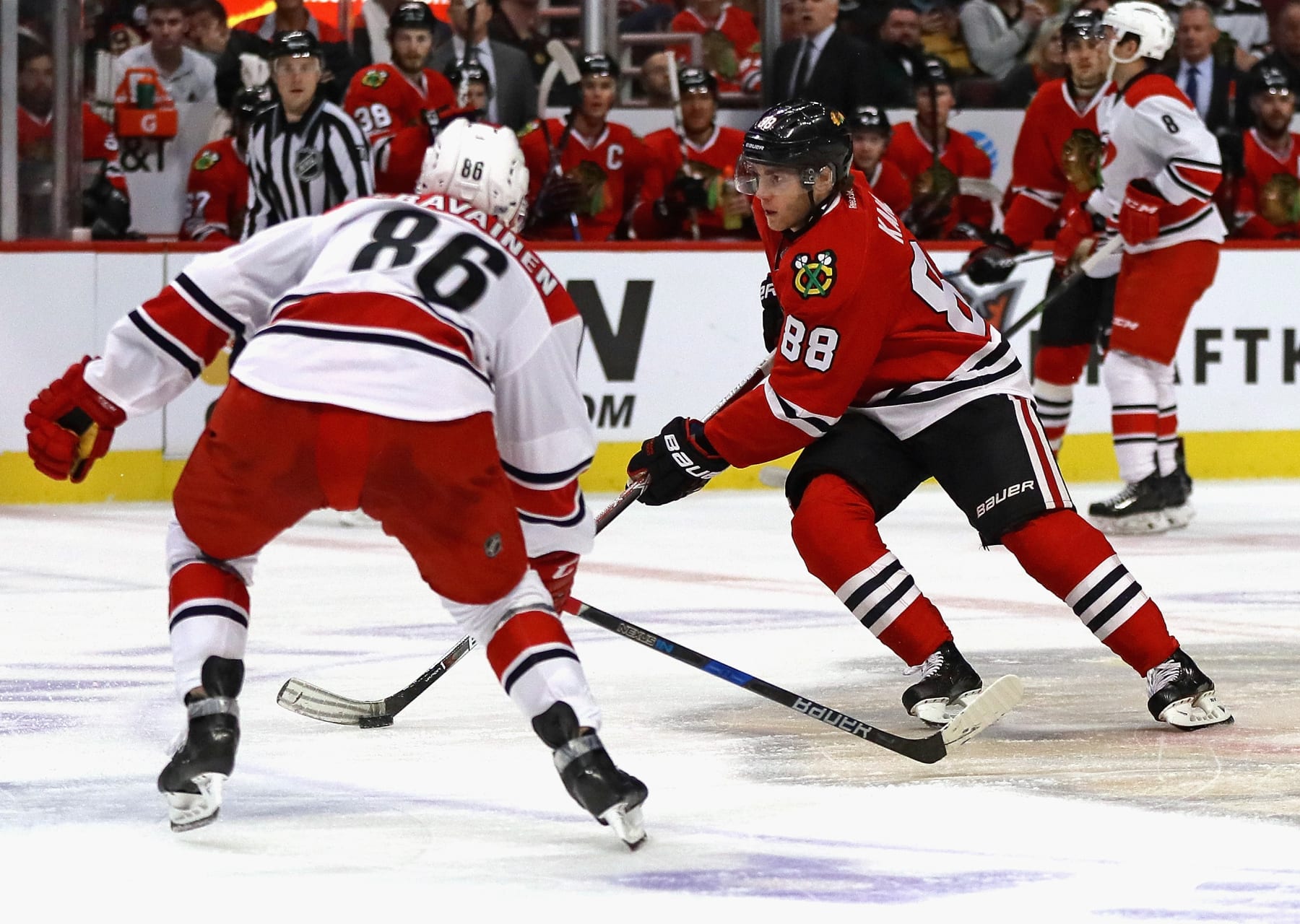 CHICAGO, IL - JANUARY 06: Patrick Kane #88 of the Chicago Blackhawks skates against Teuvo Teravainen #86 of the Carolina Hurricanes at the United Center on January 6, 2017 in Chicago, Illinois. The Blackhawks defeated the Hurricanes 2-1. (Photo by Jonathan Daniel/Getty Images)