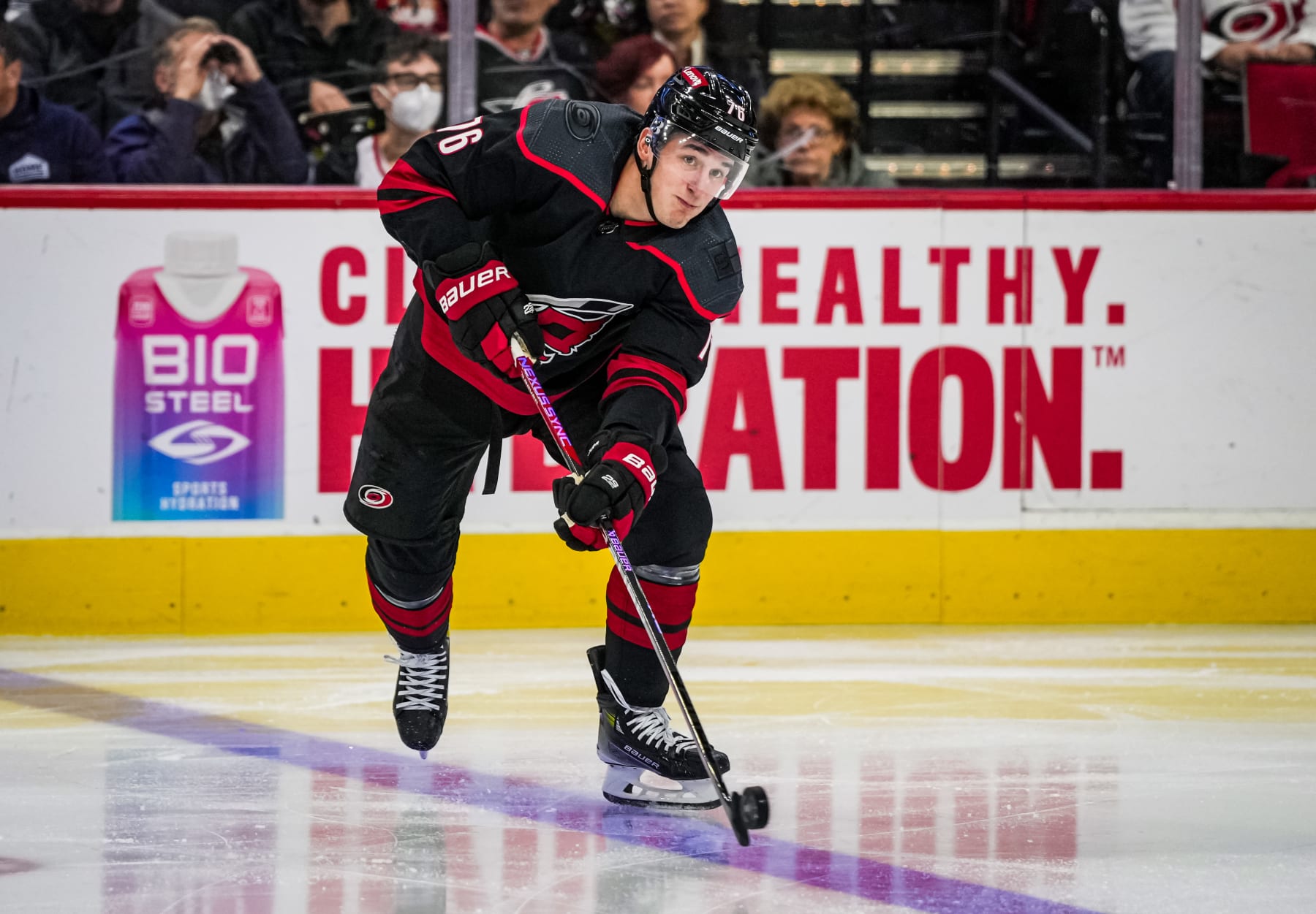 RALEIGH, NORTH CAROLINA - DECEMBER 17: Brady Skjei #76 of the Carolina Hurricanes skates during the second period against the Washington Capitals at PNC Arena on December 17, 2023 in Raleigh, North Carolina. (Photo by Josh Lavallee/NHLI via Getty Images)