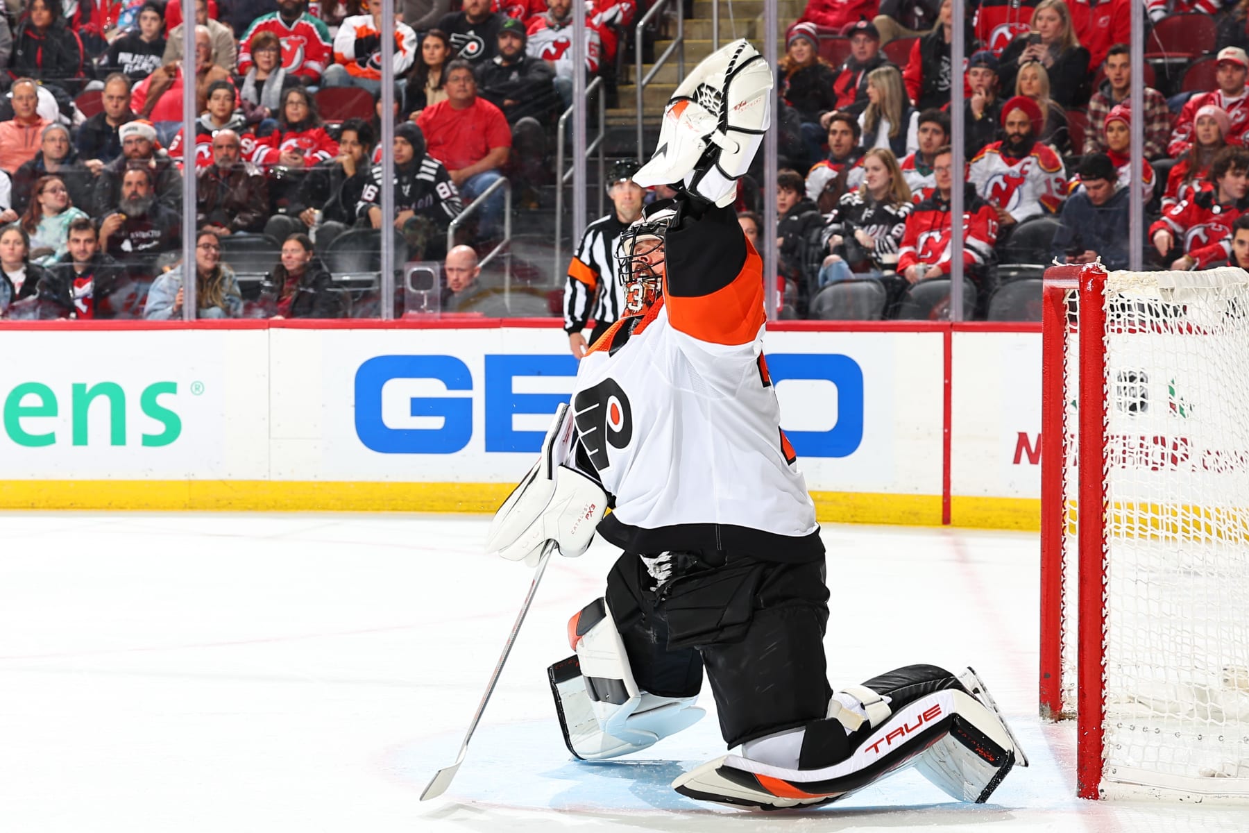 NEWARK, NJ - DECEMBER 19: Samuel Ersson #33 of the Philadelphia Flyers defends his net in the first period of the game against the New Jersey Devils at the Prudential Center on December 19, 2023 in Newark, New Jersey. (Photo by Rich Graessle/NHLI via Getty Images)