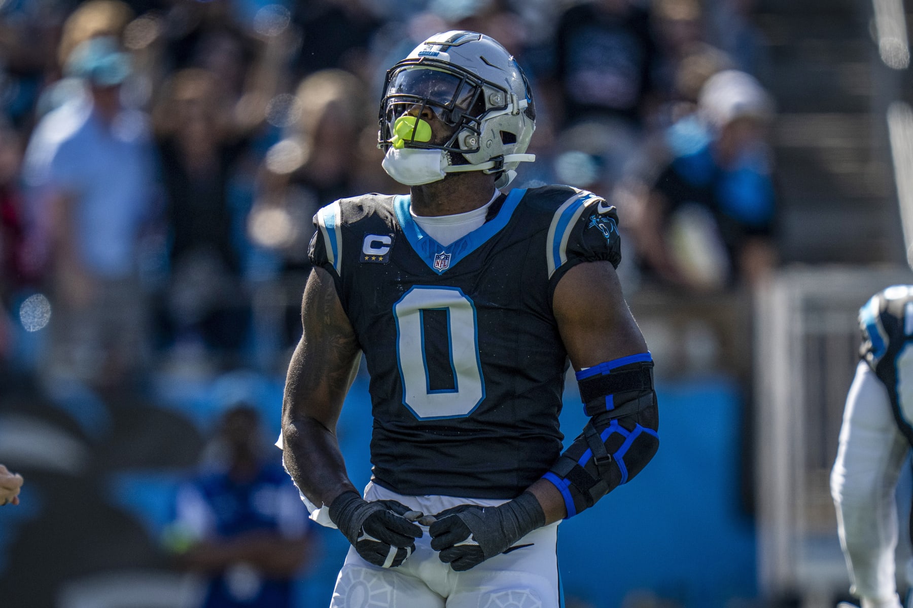 Carolina Panthers linebacker Brian Burns (0) celebrates a sack during an NFL football game against the Houston Texans on Sunday, Oct. 29, 2023, in Charlotte, N.C. (AP Photo/Rusty Jones)