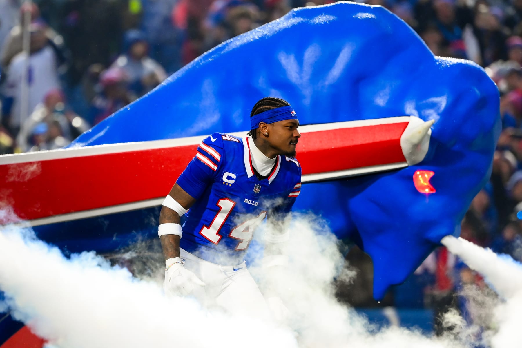 ORCHARD PARK, NEW YORK - DECEMBER 17: Stefon Diggs #14 of the Buffalo Bills jogs on the field during player introductions prior to the game against the Dallas Cowboys at Highmark Stadium on December 17, 2023 in Orchard Park, New York. The Bills won 31-10. (Photo by Rich Barnes/Getty Images)