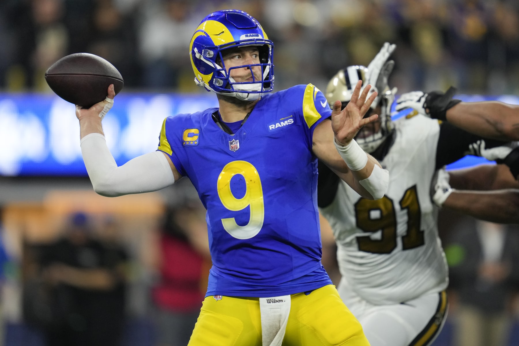 Los Angeles Rams quarterback Matthew Stafford (9) throws a pass against the New Orleans Saints during the second half of an NFL football game Thursday, Dec. 21, 2023, in Inglewood, Calif. (AP Photo/Ashley Landis)