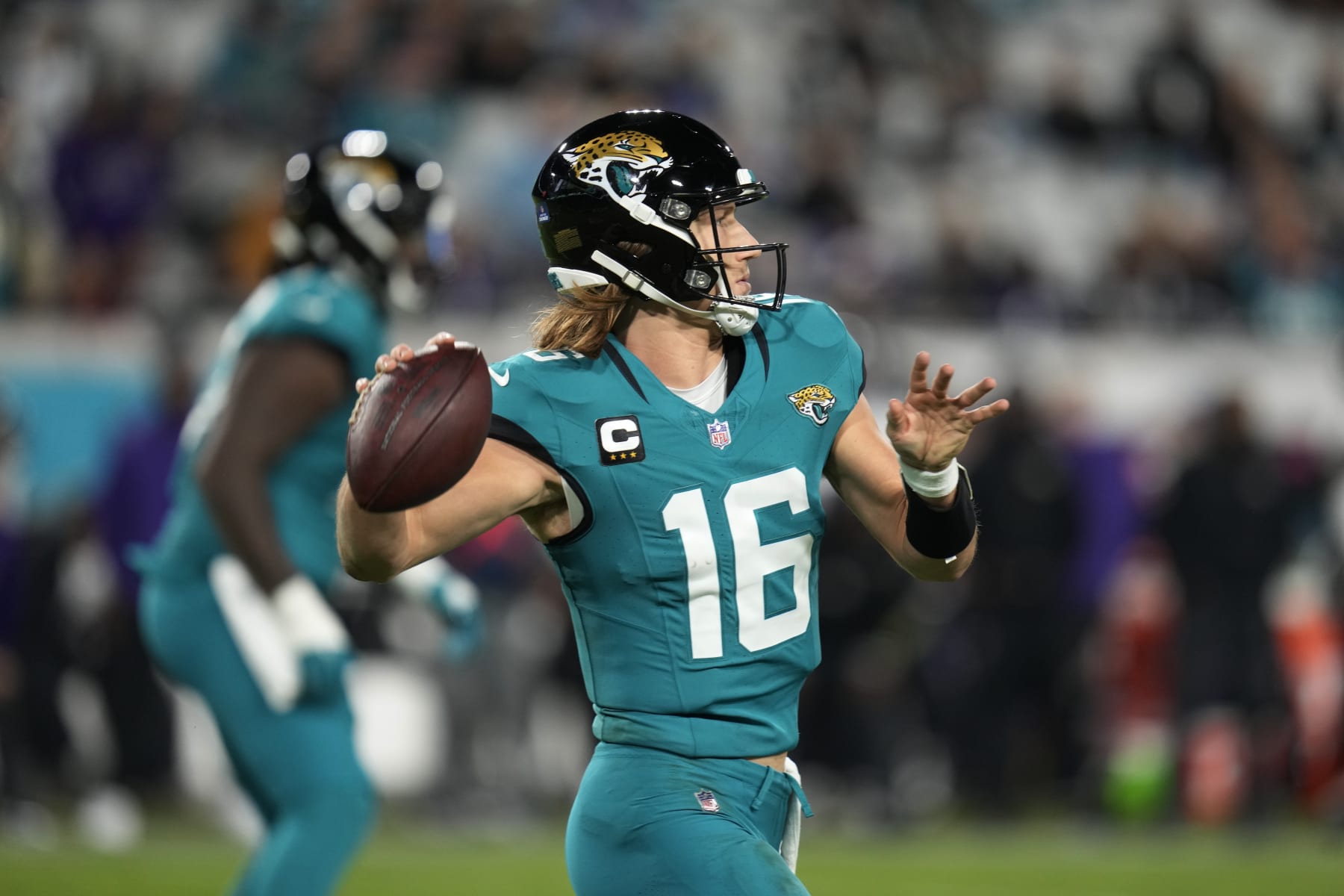 Jacksonville Jaguars quarterback Trevor Lawrence (16) passes against the Baltimore Ravens in the second half of an NFL football game Sunday, Dec. 17, 2023, in Jacksonville, Fla. (AP Photo/John Raoux)