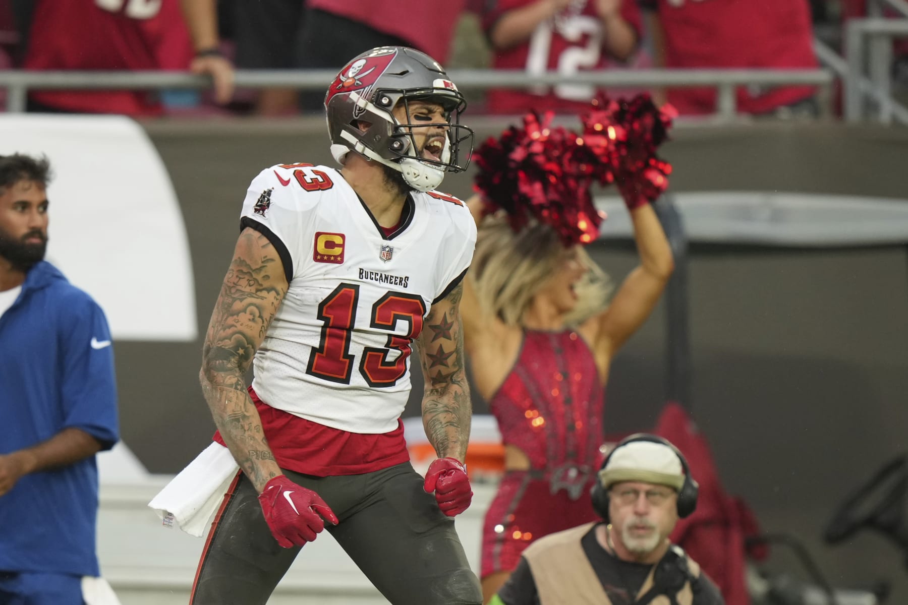 Tampa Bay Buccaneers wide receiver Mike Evans (13) celebrates after a deep catch for a big gain during an NFL football game against the Carolina Panthers, Sunday, Dec. 3, 2023, in Tampa, Fla. (AP Photo/Peter Joneleit)