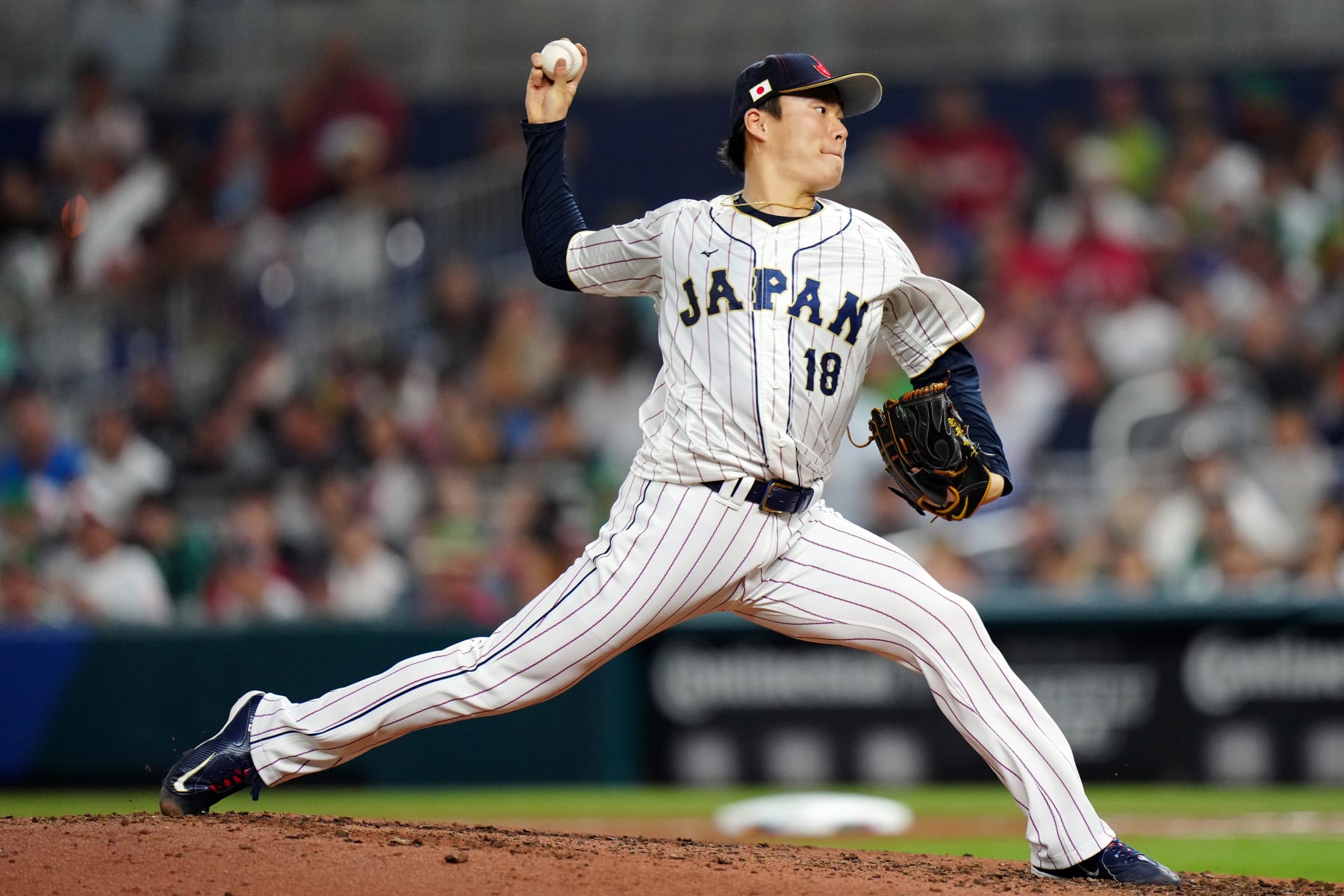 MIAMI, FL - MARCH 20: Yoshinobu Yamamoto #18 of Team Japan pitches during the 2023 World Baseball Classic Semifinal game between Team Mexico and Team Japan at loanDepot Park on Monday, March 20, 2023 in Miami, Florida. (Photo by Daniel Shirey/WBCI/MLB Photos via Getty Images)
