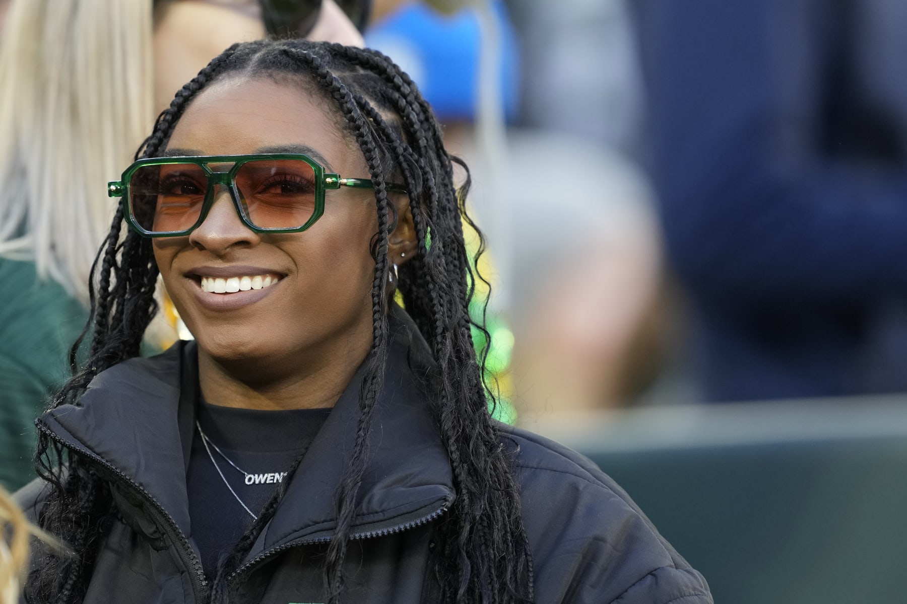 GREEN BAY, WISCONSIN - NOVEMBER 19: Simone Biles looks on before the game between the Green Bay Packers and Los Angeles Chargers at Lambeau Field on November 19, 2023 in Green Bay, Wisconsin. (Photo by Patrick McDermott/Getty Images)