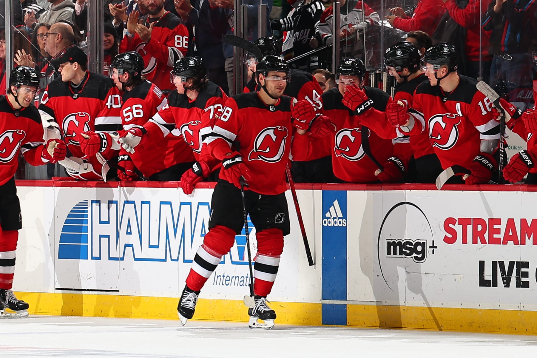 NEWARK, NJ - DECEMBER 21: Timo Meier #28 of the New Jersey Devils celebrates his goal with the bench in the second period of the game against the Edmonton Oilers at the Prudential Center on December 21, 2023 in Newark, New Jersey. (Photo by Rich Graessle/NHLI via Getty Images)