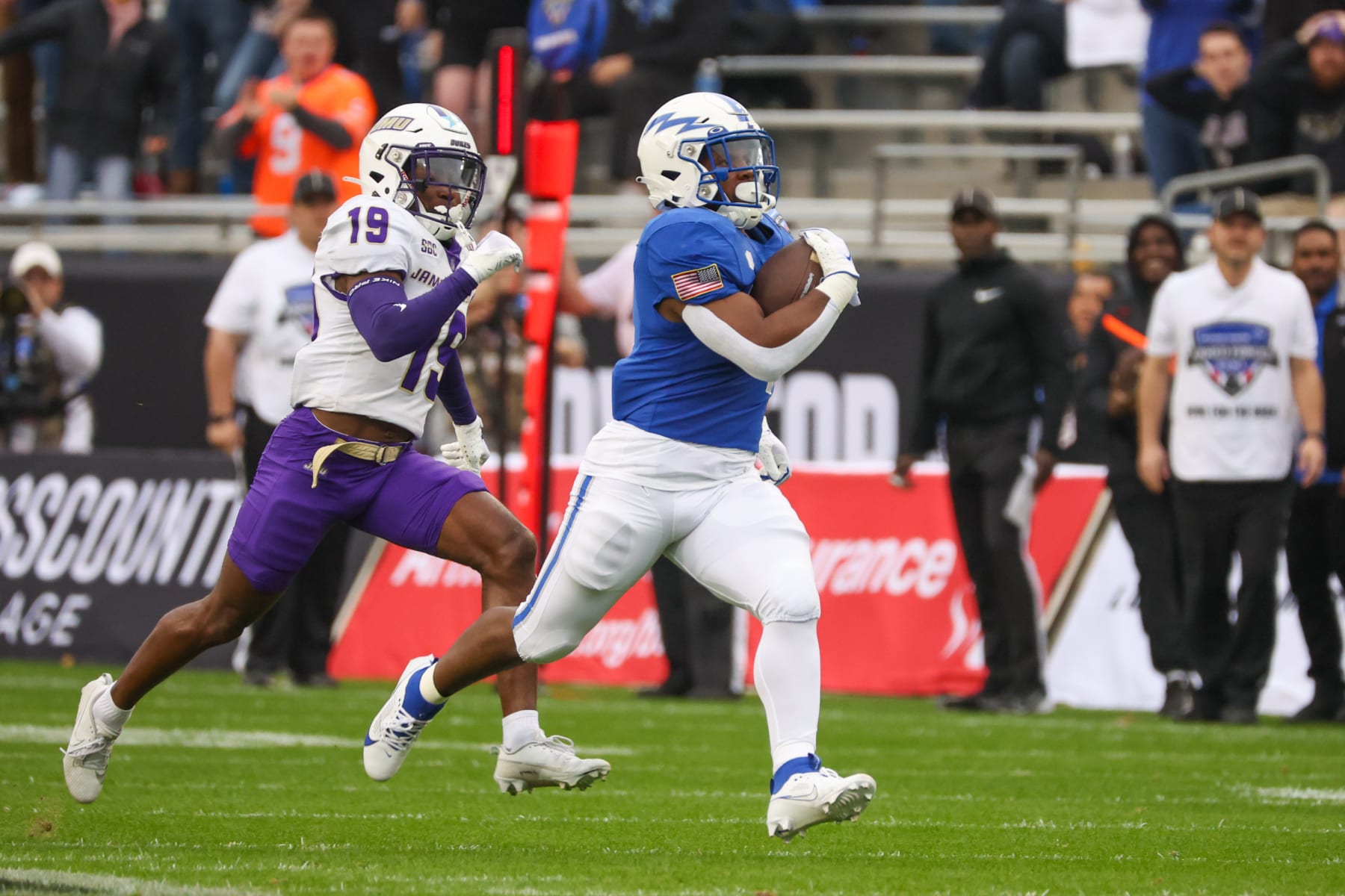 FORT WORTH, TX - DECEMBER 23: Air Force Falcons fullback Emmanuel Michel (4) runs for a first down during the Lockheed Martin Armed Forces Bowl between the James Madison Dukes and the Air Force Falcons on December 23, 2023 at Amon G. Carter Stadium in Fort Worth, TX. (Photo by George Walker/Icon Sportswire via Getty Images)