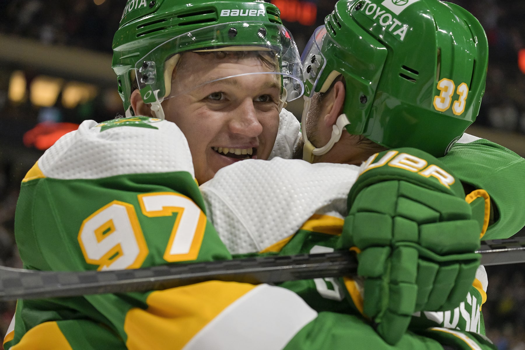 ST. PAUL, MN - DECEMBER 23: Minnesota Wild Left Wing Kirill Kaprizov (97) celebrates his goal with Minnesota Wild Defenceman Alex Goligoski (33) who assisted on the play during the second period of an NHL game between the Minnesota Wild and Boston Bruins on December 23, 2023, at Xcel Energy Center in St. Paul, MN.(Photo by Nick Wosika/Icon Sportswire via Getty Images)