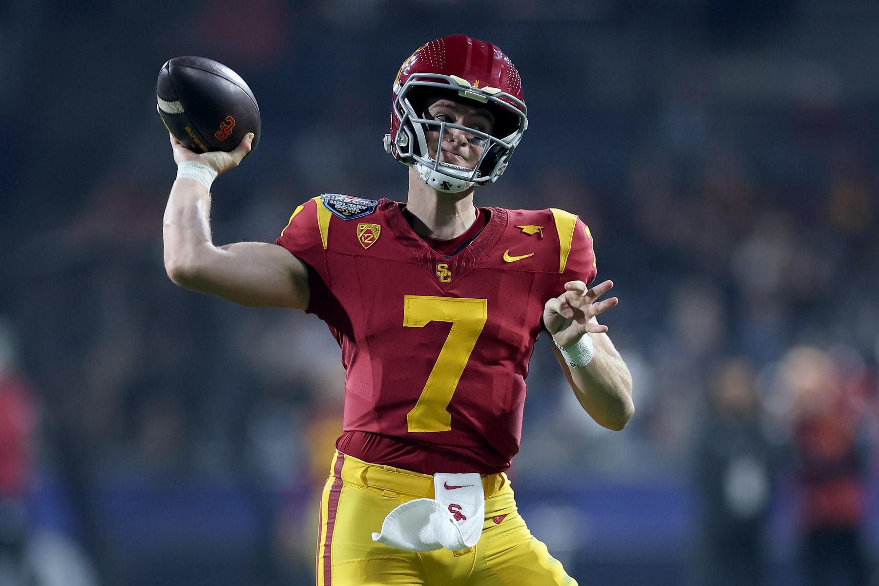 SAN DIEGO, CALIFORNIA - DECEMBER 27: Miller Moss #7 of the USC Trojans passes the ball during the first half of the DIRECTV Holiday Bowl against the Louisville Cardinals at Petco Park on December 27, 2023 in San Diego, California. (Photo by Sean M. Haffey/Getty Images)