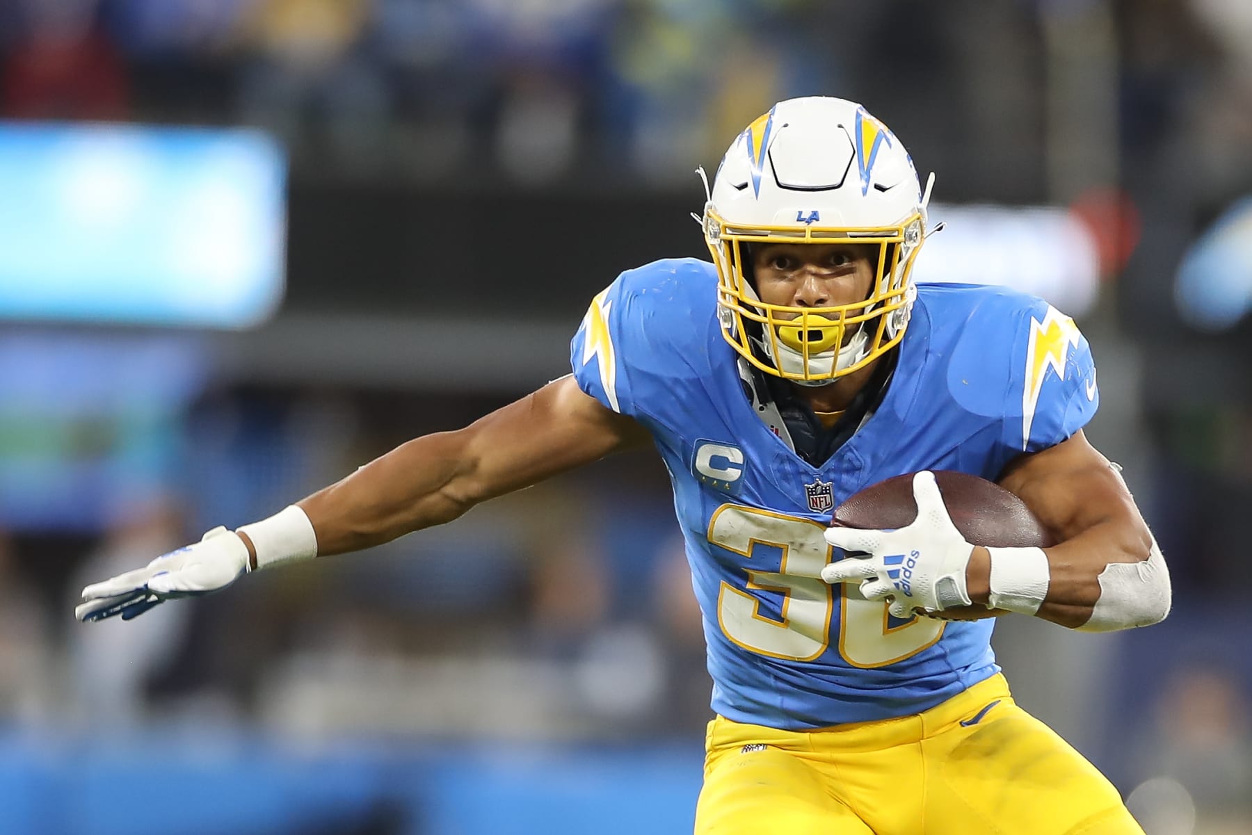 INGLEWOOD, CA - DECEMBER 23: Los Angeles Chargers running back Austin Ekeler (30) runs the football during the NFL game between the Buffalo Bills and the Los Angeles Chargers on December 23, 2023, at SoFi Stadium in Inglewood, CA. (Photo by Jevone Moore/Icon Sportswire via Getty Images)