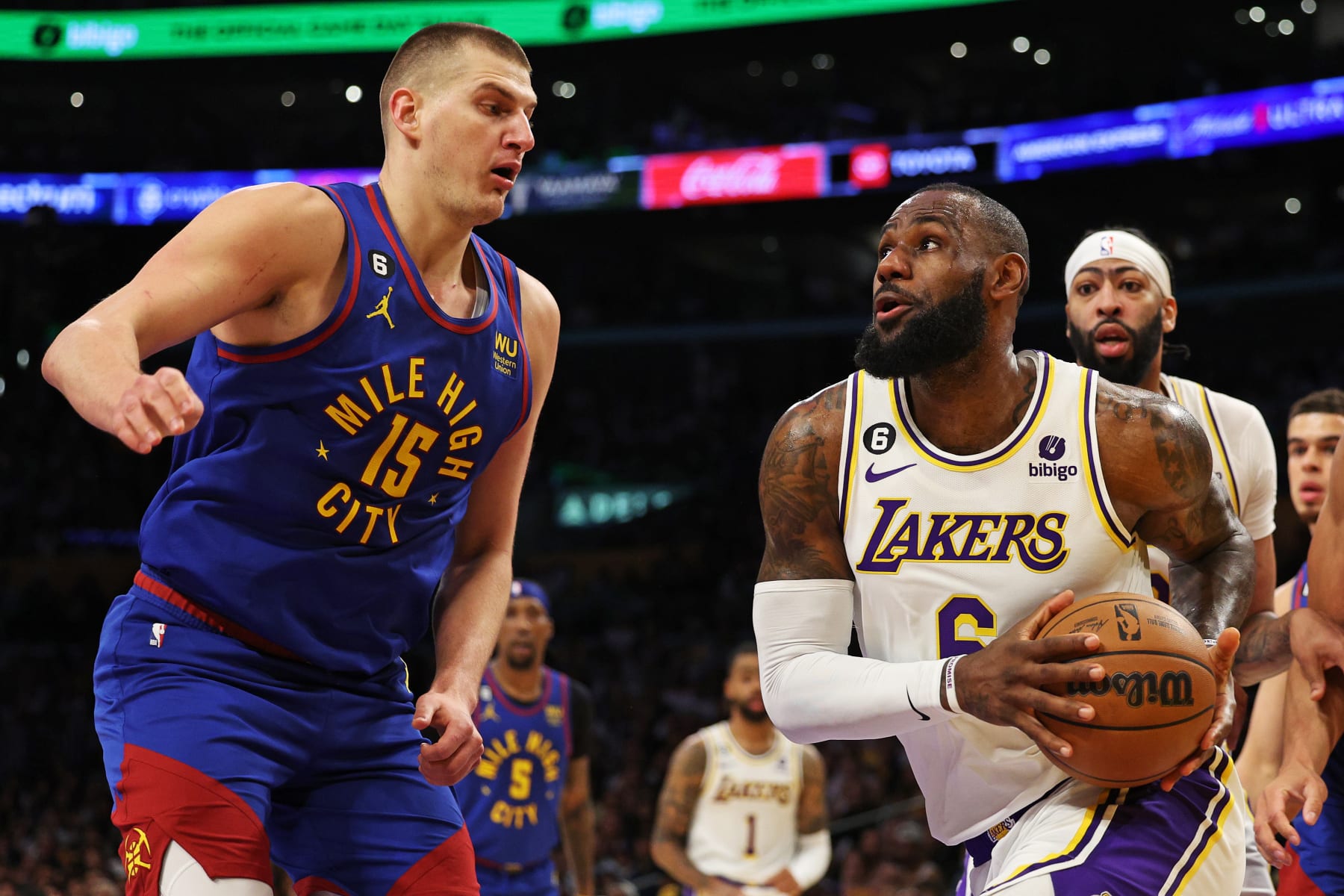 LOS ANGELES, CALIFORNIA - MAY 20: LeBron James #6 of the Los Angeles Lakers drives to the basket against Nikola Jokic #15 of the Denver Nuggets during the first quarter in game three of the Western Conference Finals at Crypto.com Arena on May 20, 2023 in Los Angeles, California. NOTE TO USER: User expressly acknowledges and agrees that, by downloading and or using this photograph, User is consenting to the terms and conditions of the Getty Images License Agreement. (Photo by Harry How/Getty Images)