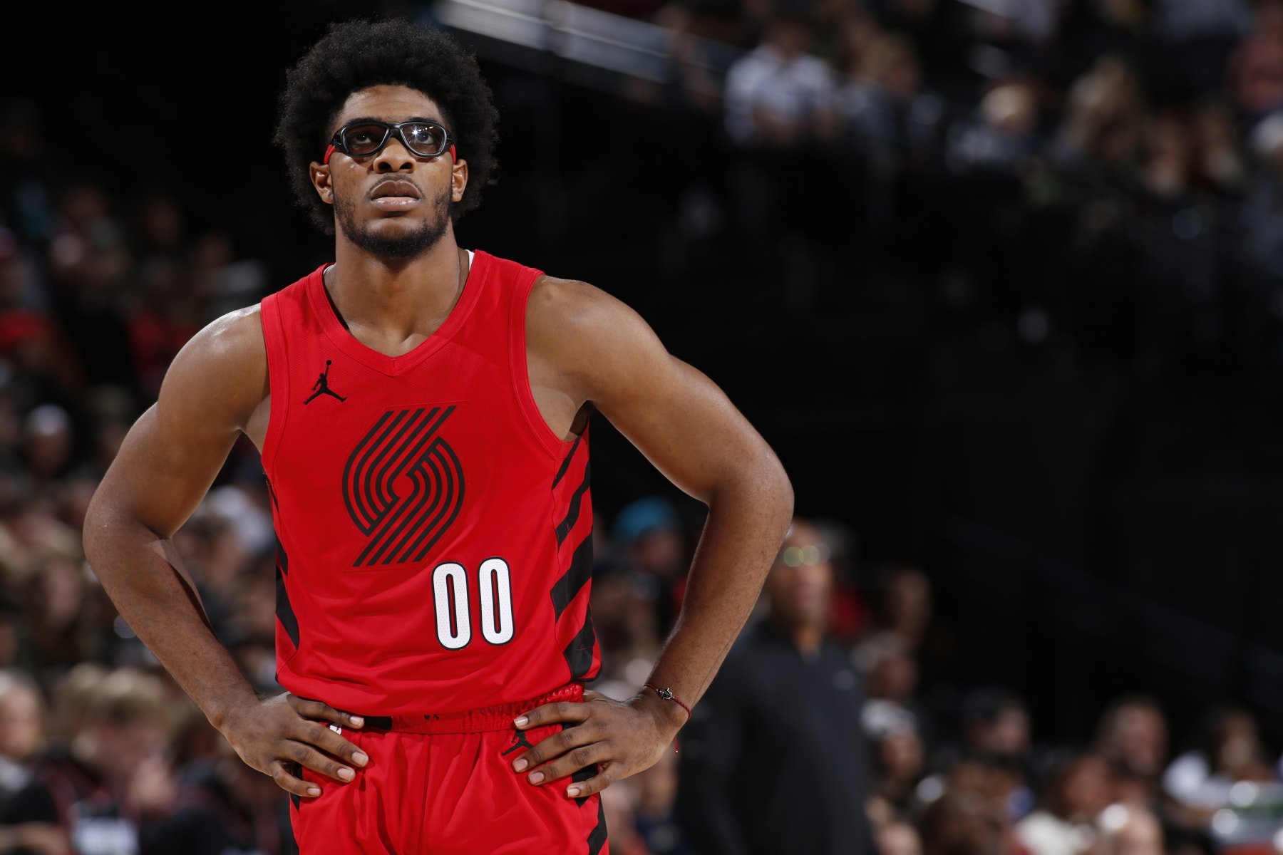 PORTLAND, OR - DECEMBER 26: Scoot Henderson #00 of the Portland Trail Blazers looks on during the game against the Sacramento Kings on December 26, 2023 at the Moda Center Arena in Portland, Oregon. NOTE TO USER: User expressly acknowledges and agrees that, by downloading and or using this photograph, user is consenting to the terms and conditions of the Getty Images License Agreement. Mandatory Copyright Notice: Copyright 2023 NBAE (Photo by Cameron Browne/NBAE via Getty Images)