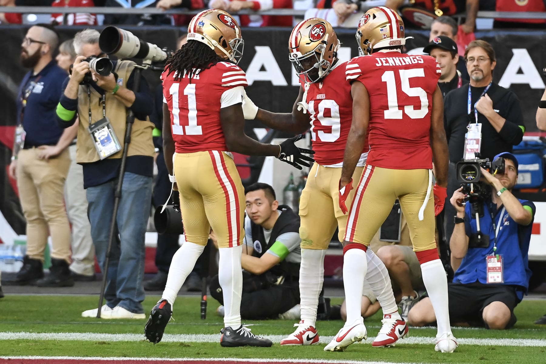 GLENDALE, ARIZONA - DECEMBER 17: Deebo Samuel #19 of the San Francisco 49ers celebrates a touchdown during the first quarter of a game against the Arizona Cardinals at State Farm Stadium on December 17, 2023 in Glendale, Arizona. (Photo by Norm Hall/Getty Images)