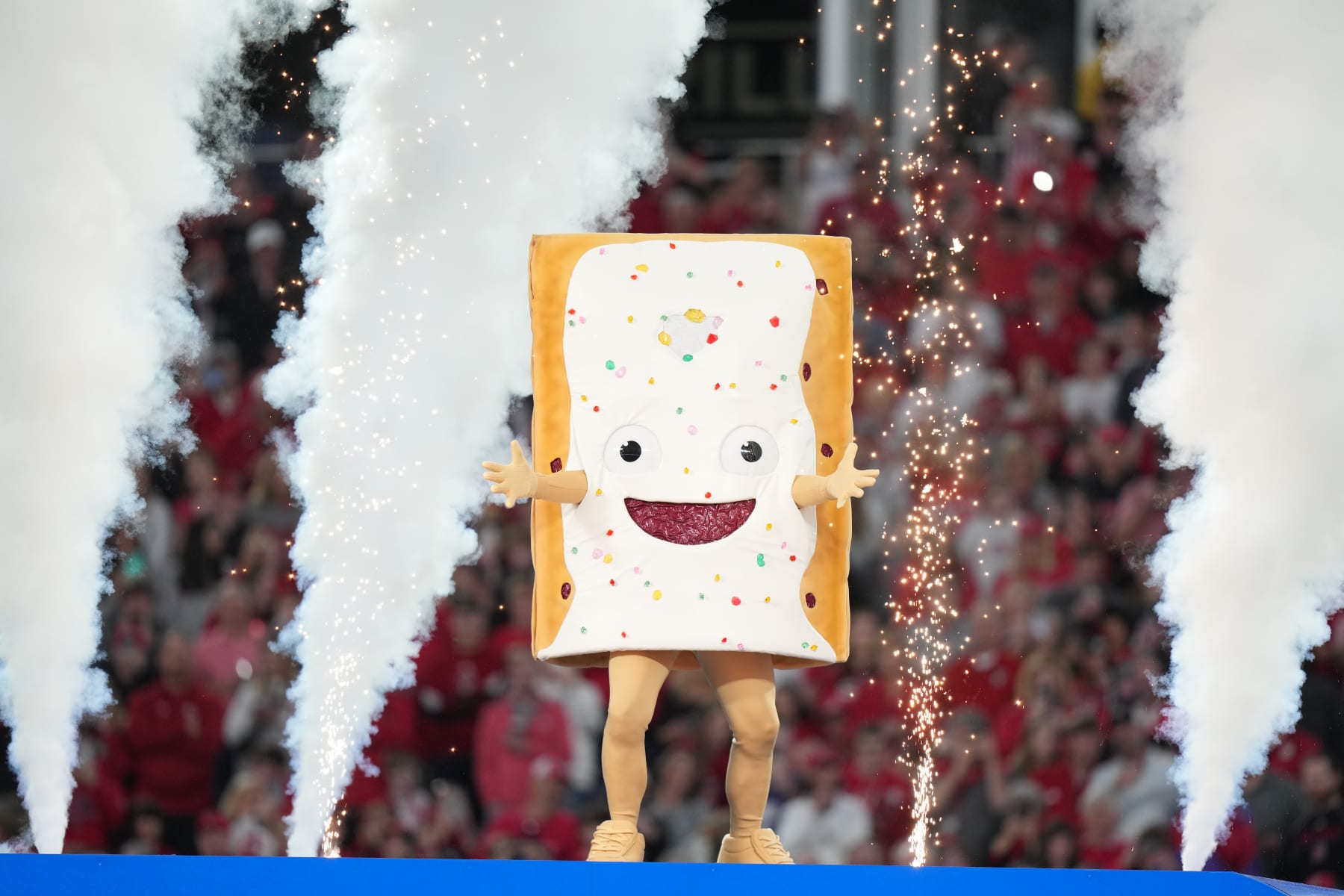ORLANDO, FL - DECEMBER 28: the Pop-Tarts mascot Strawberry poses for a photo before the Pop-Tarts Bowl between the North Carolina State Wolfpack and the Kansas State Wildcats on Thursday, December 28, 2023 at Camping World Stadium, Orlando, Fla. (Photo by Peter Joneleit/Icon Sportswire via Getty Images)