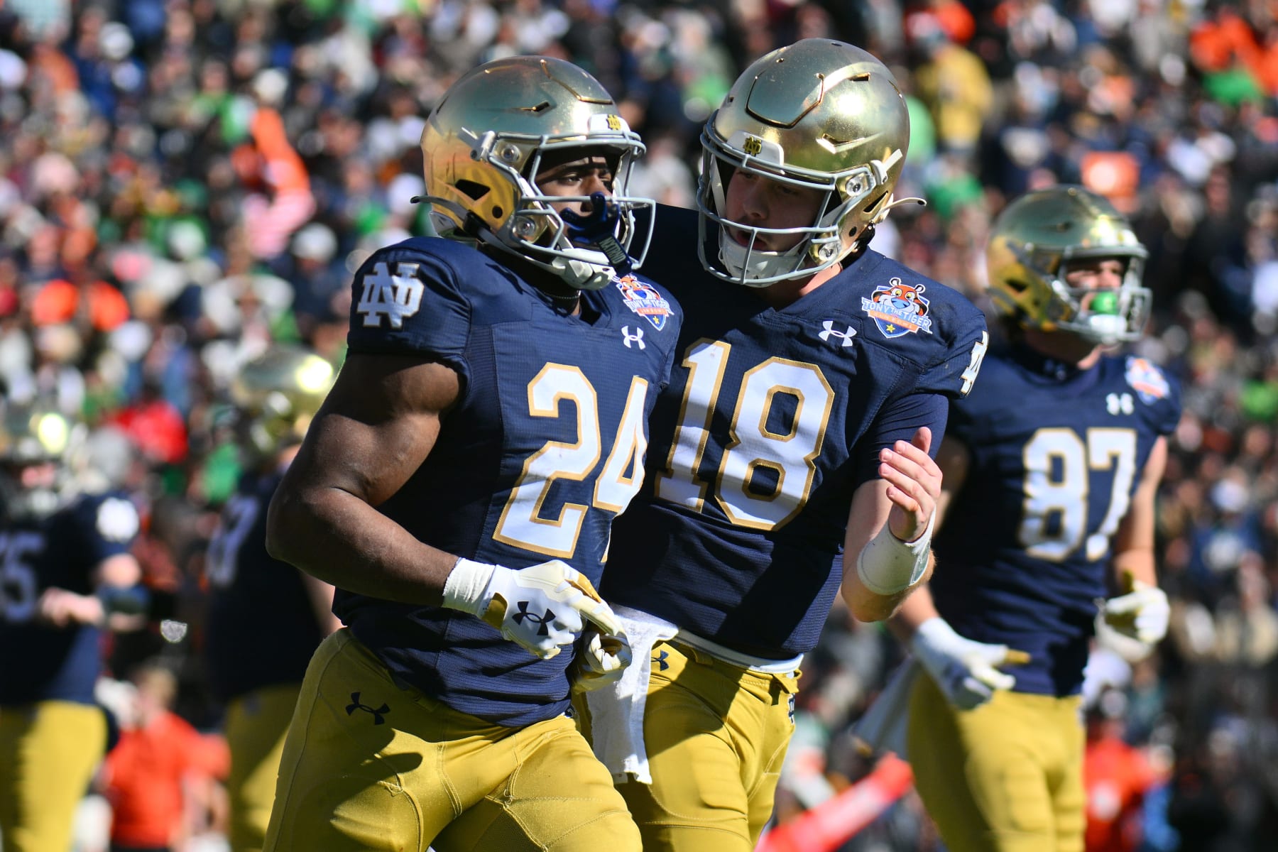 EL PASO, TEXAS - DECEMBER 29: Running back Jadarian Price #24 and quarterback Steve Angeli #18 of the Notre Dame Fighting Irish celebrate after the Irish scored a touchdown against the Oregon State Beavers during the first half of the Tony the Tiger Sun Bowl game between the Notre Dame Fighting Irish and the Oregon State Beavers at Sun Bowl Stadium on December 29, 2023 in El Paso, Texas. (Photo by Sam Wasson/Getty Images)