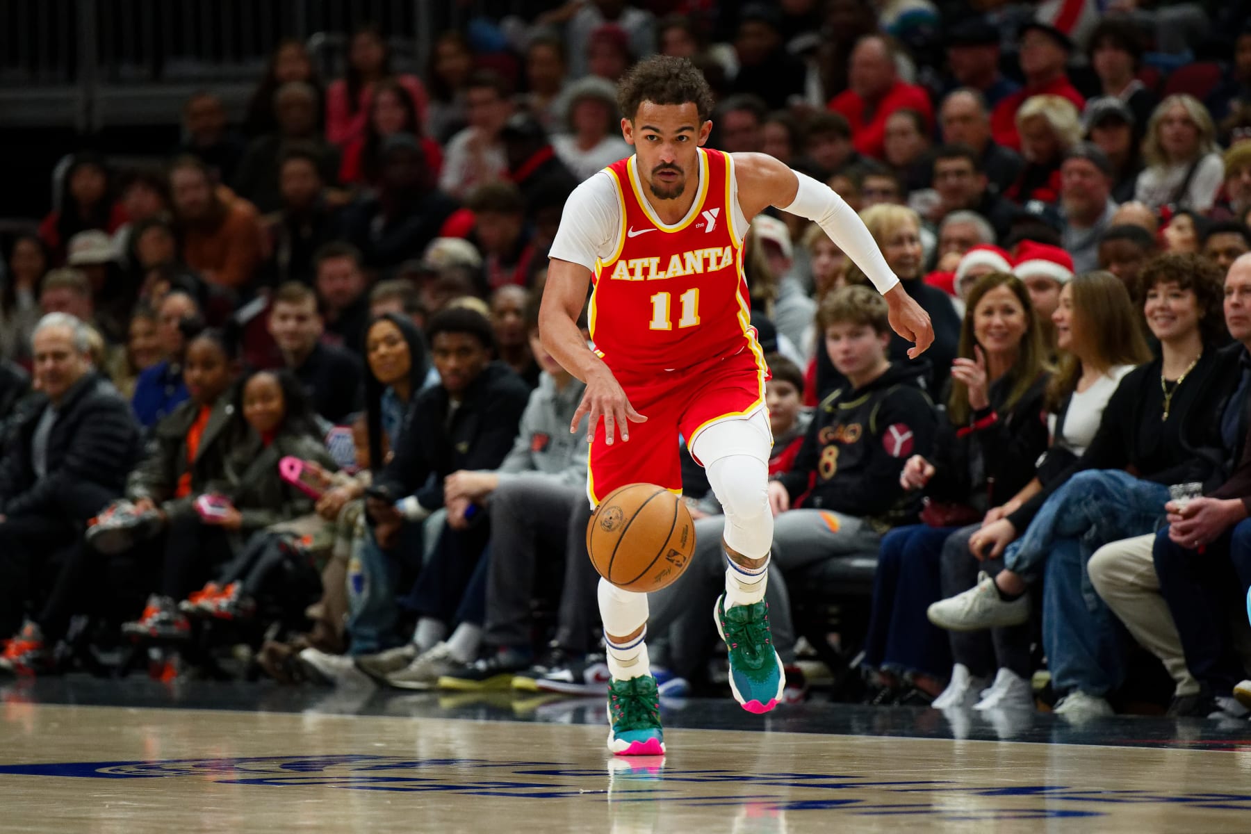 CHICAGO, ILLINOIS - DECEMBER 26: Trae Young #11 of the Atlanta Hawks controls the ball against the Chicago Bulls on December 26, 2023 at United Center in Chicago, Illinois. NOTE TO USER: User expressly acknowledges and agrees that, by downloading and or using this photograph, User is consenting to the terms and conditions of the Getty Images License Agreement. (Photo by Jamie Sabau/Getty Images)
