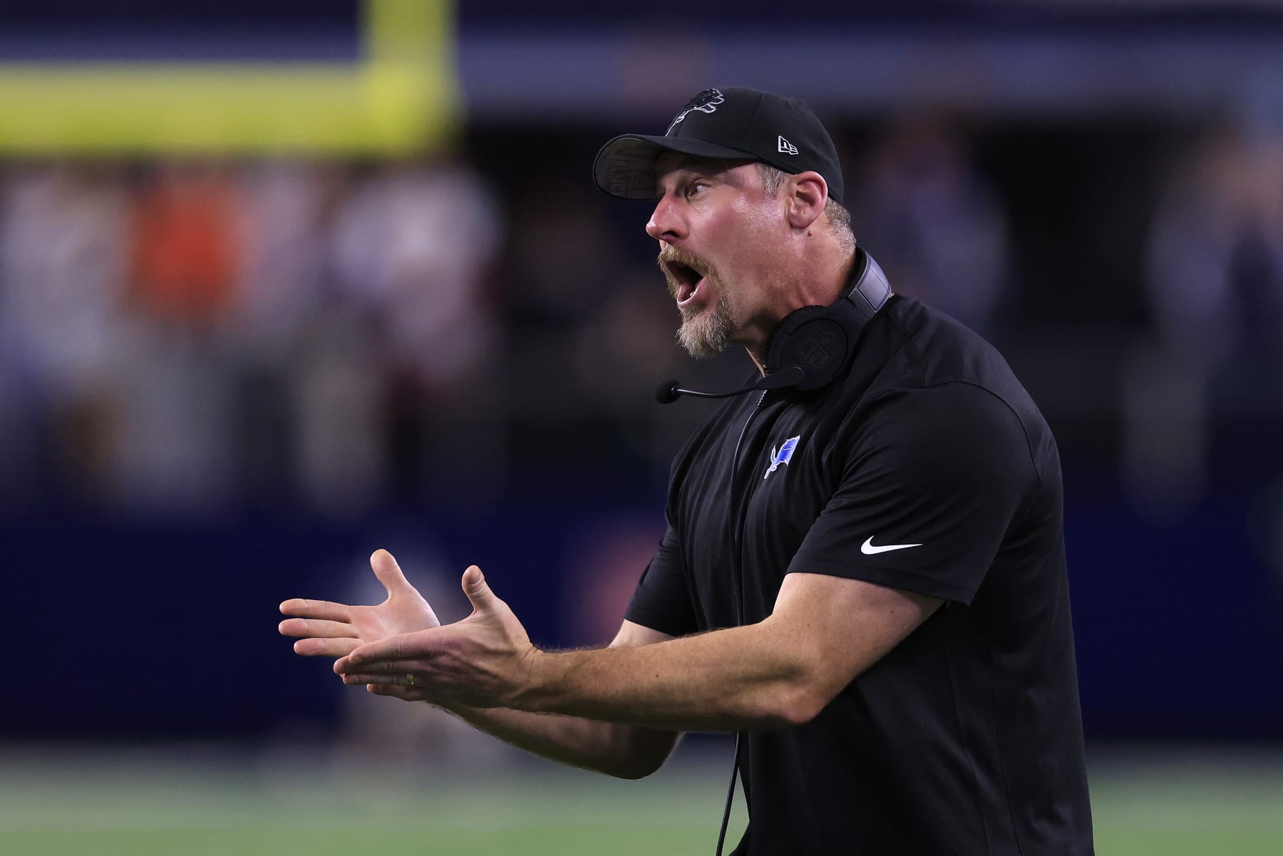 ARLINGTON, TEXAS - DECEMBER 30: Head coach Dan Campbell of the Detroit Lions reacts to a penalty during a two point conversion attempt against the Dallas Cowboys during the fourth quarter in the game at AT&T Stadium on December 30, 2023 in Arlington, Texas. (Photo by Ron Jenkins/Getty Images)