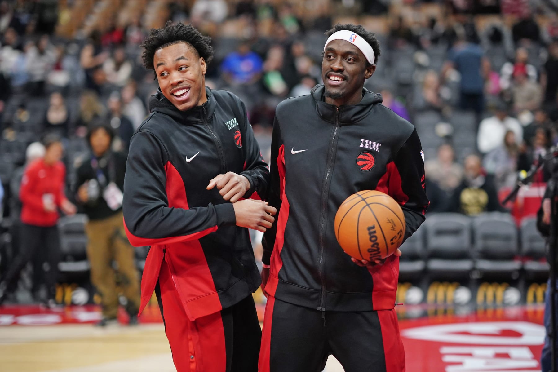 TORONTO, CANADA - DECEMBER 18: Scottie Barnes #4 and Pascal Siakam #43 of the Toronto Raptors smile before the game against the Charlotte Hornets on December 18, 2023 at the Scotiabank Arena in Toronto, Ontario, Canada. NOTE TO USER: User expressly acknowledges and agrees that, by downloading and or using this Photograph, user is consenting to the terms and conditions of the Getty Images License Agreement. Mandatory Copyright Notice: Copyright 2023 NBAE (Photo by Mark Blinch/NBAE via Getty Images)