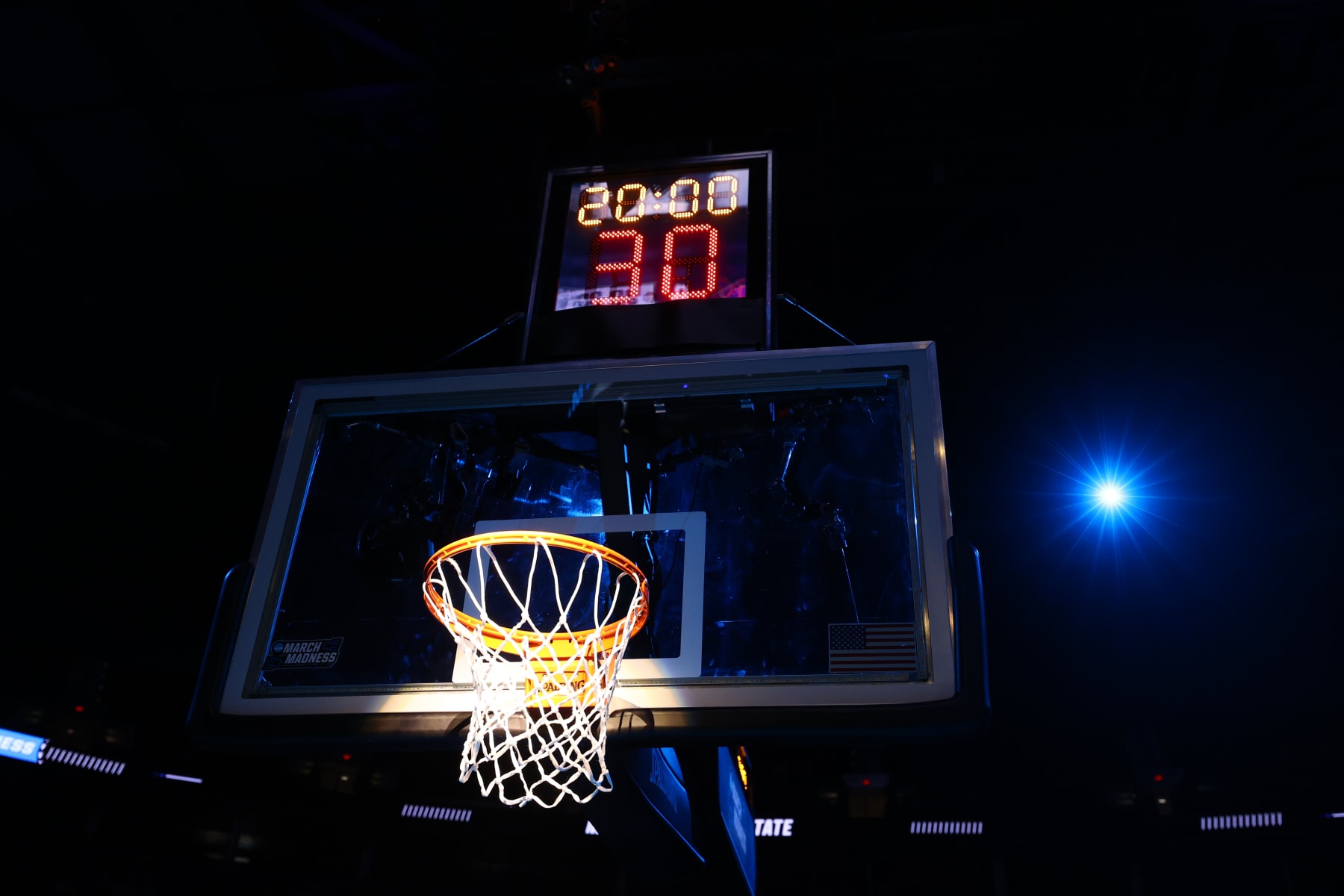 PORTLAND, OR - MARCH 17: A basketball hoop is lit before the Boise State Broncos take on the Memphis Tigers during the first round of the 2022 NCAA Men's Basketball Tournament held at the Moda Center on March 17, 2022 in Portland, Oregon. (Photo by Jamie Schwaberow/NCAA Photos via Getty Images)