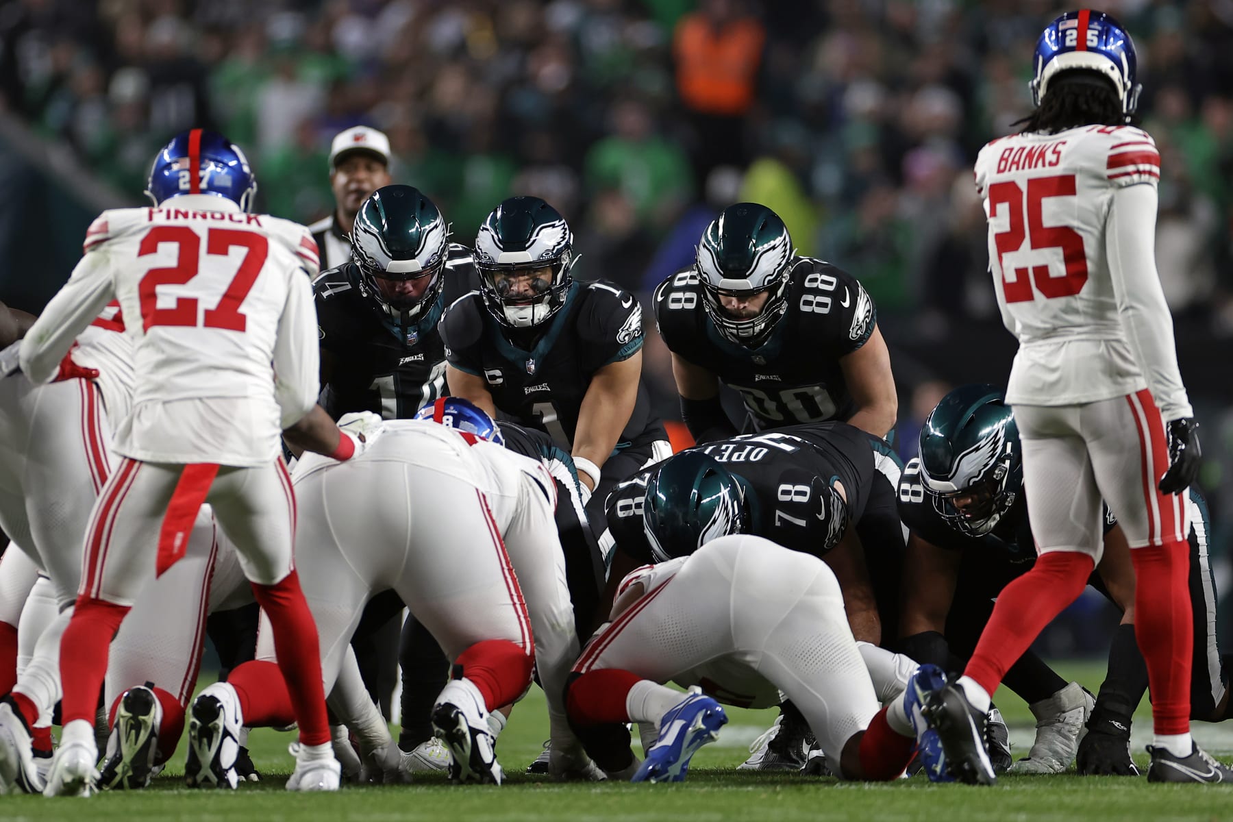 PHILADELPHIA, PENNSYLVANIA - DECEMBER 25: Jalen Hurts #1 of the Philadelphia Eagles at the line of scrimmage against the New York Giants at Lincoln Financial Field on December 25, 2023 in Philadelphia, Pennsylvania. (Photo by Adam Hunger/Getty Images)