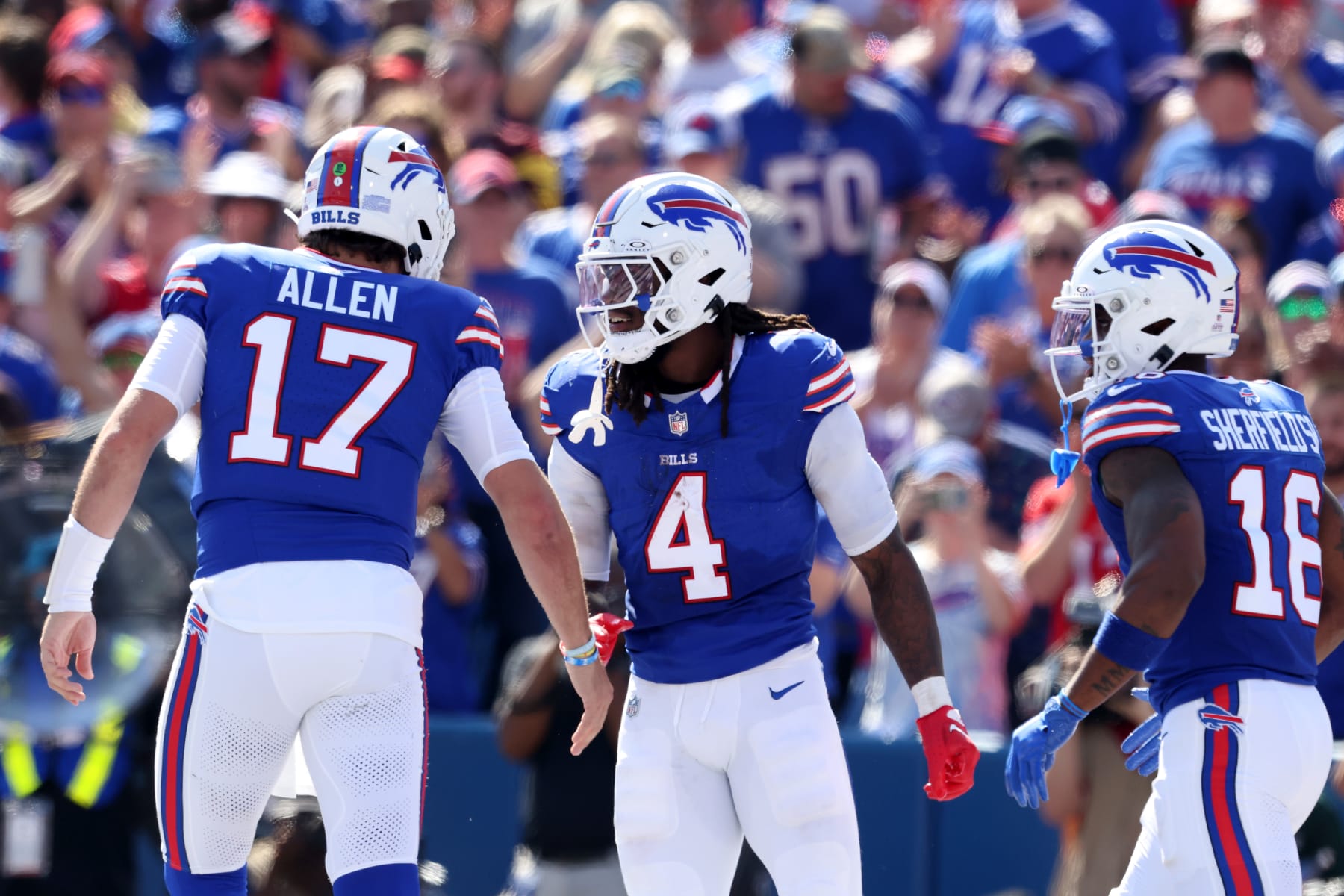 ORCHARD PARK, NEW YORK - OCTOBER 01: Josh Allen #17 and James Cook #4 of the Buffalo Bills celebrate Cook's touchdown against the Miami Dolphins during the first quarter at Highmark Stadium on October 01, 2023 in Orchard Park, New York. (Photo by Bryan M. Bennett/Getty Images)