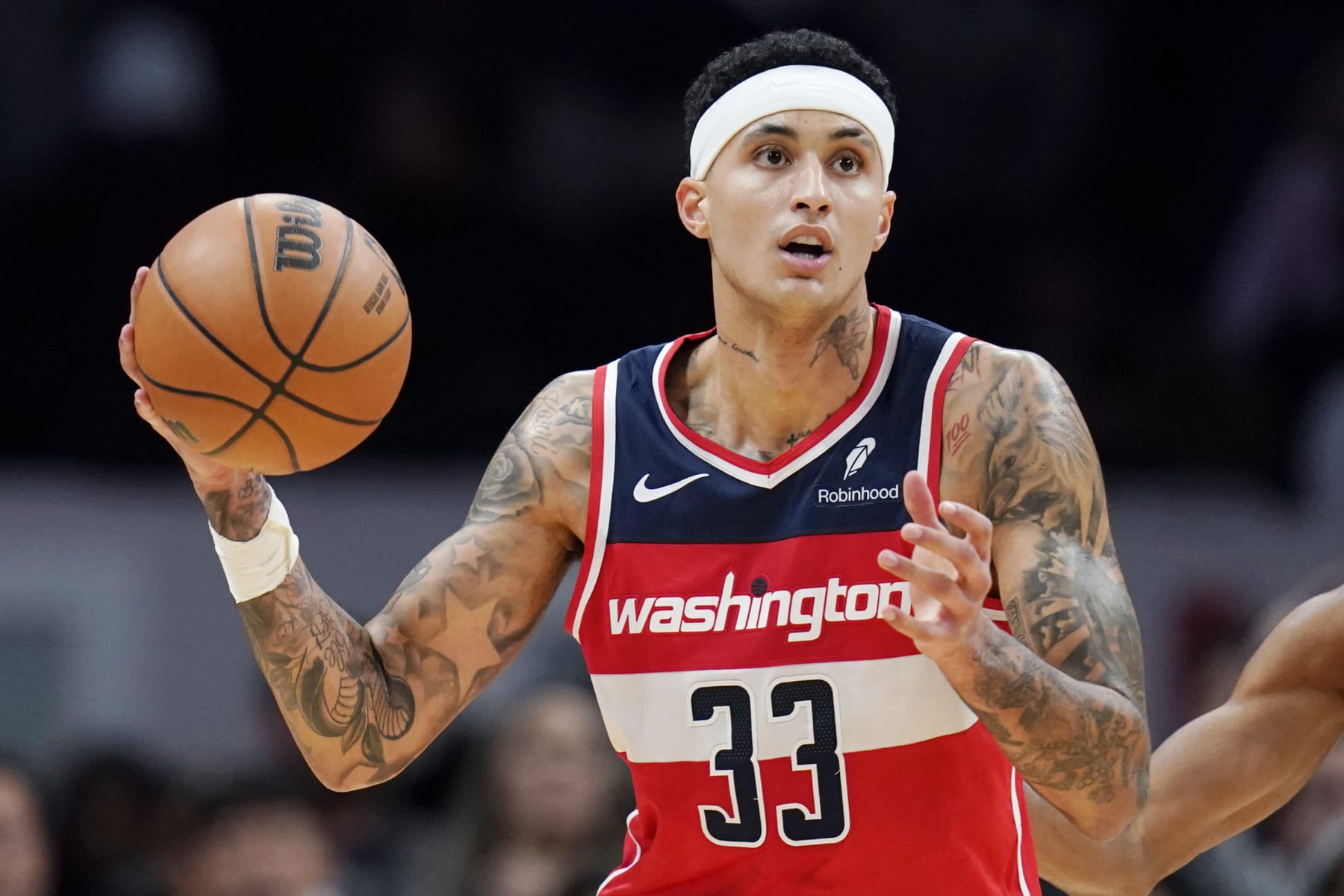 WASHINGTON, DC - DECEMBER 29: Kyle Kuzma #33 of the Washington Wizards controls the ball during the fourth quarter against the Brooklyn Nets at Capital One Arena on December 29, 2023 in Washington, DC. NOTE TO USER: User expressly acknowledges and agrees that, by downloading and or using this photograph, User is consenting to the terms and conditions of the Getty Images License Agreement. (Photo by Jess Rapfogel/Getty Images)