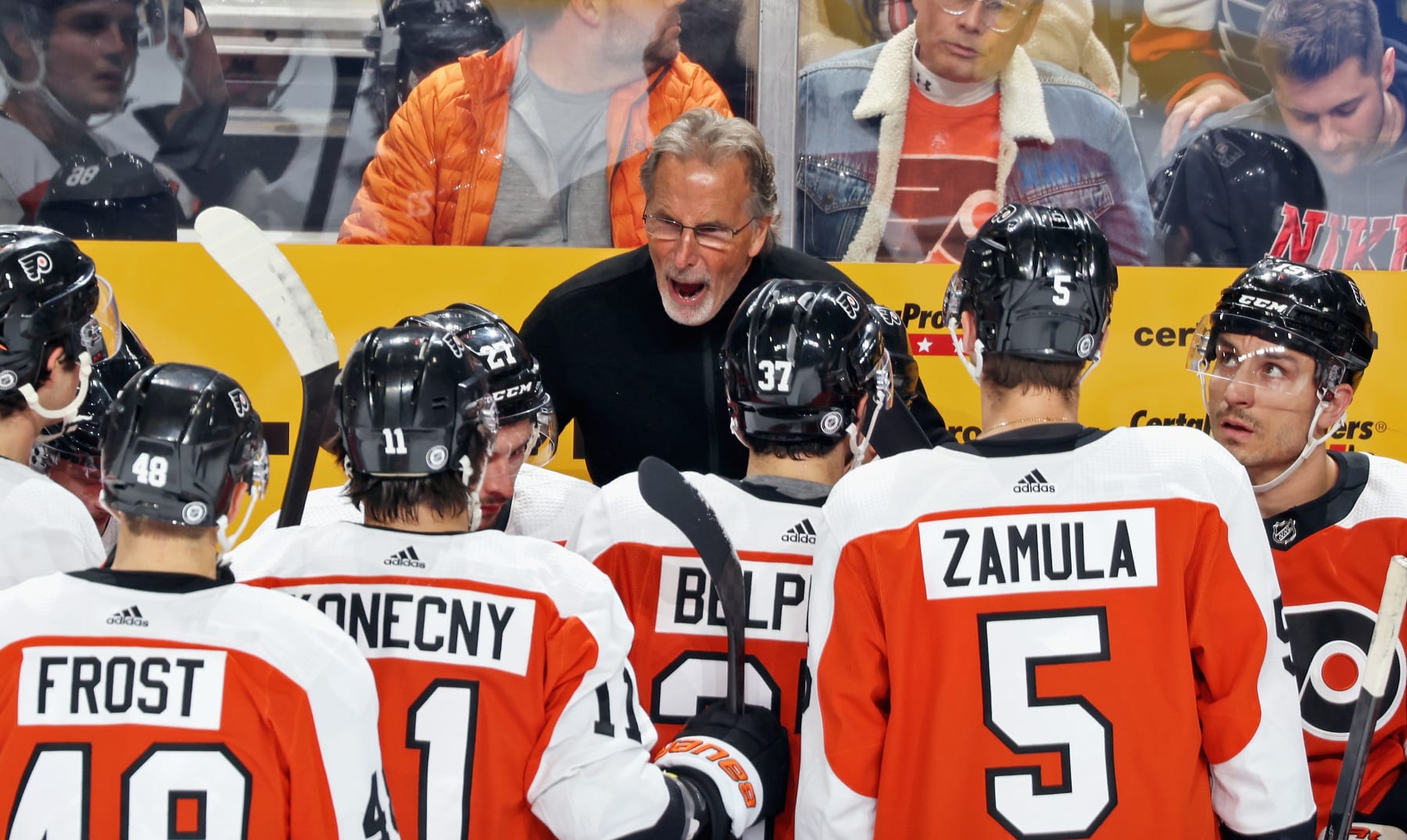 PHILADELPHIA, PENNSYLVANIA - NOVEMBER 01: Head Coach of the Philadelphia Flyers John Tortorella speaks with his team during a first period stoppage in play against the Buffalo Sabres at the Wells Fargo Center on November 1, 2023 in Philadelphia, Pennsylvania. (Photo by Len Redkoles/NHLI via Getty Images)