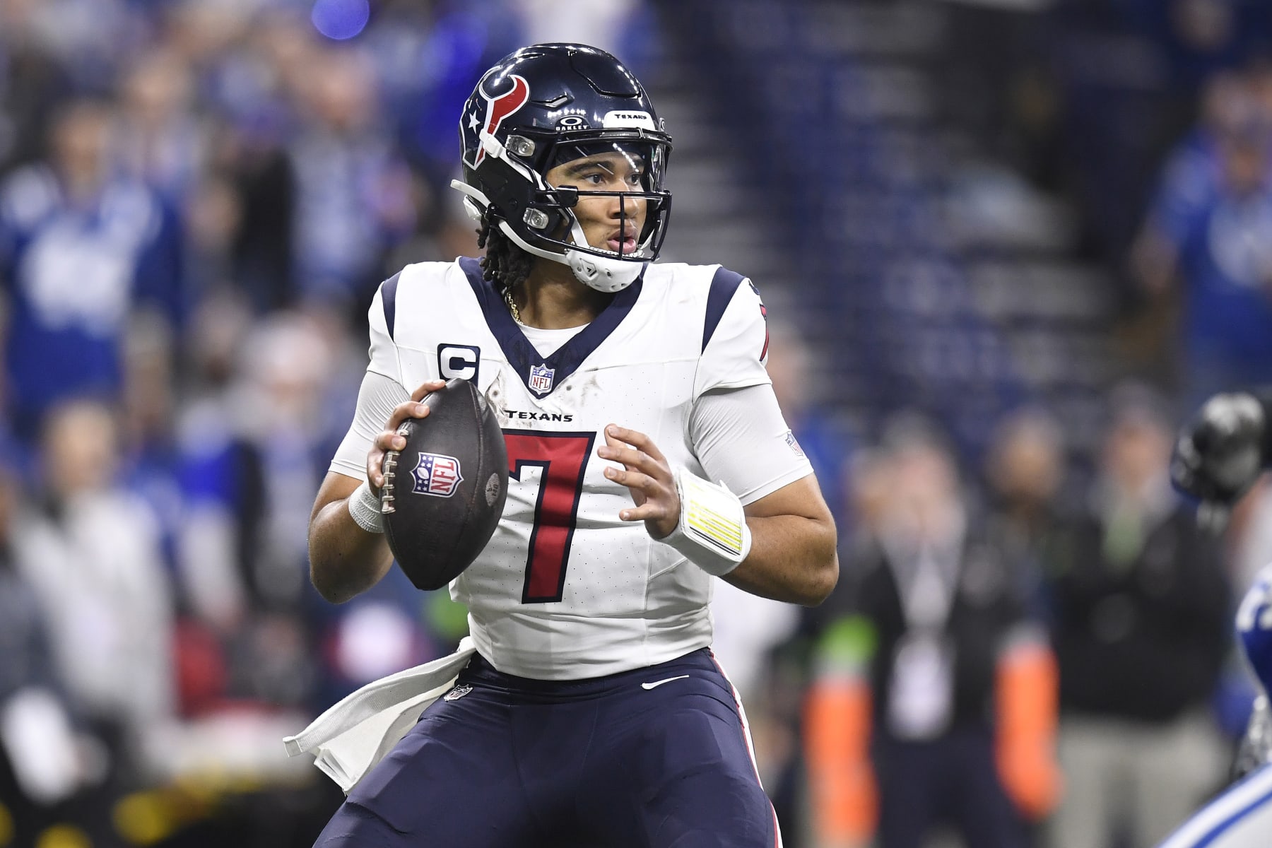 INDIANAPOLIS, IN - JANUARY 06: Houston Texans Quarterback C.J. Stroud (7) looks to pass during the NFL game between the Houston Texans and the Indianapolis Colts on January 6, 2024, at Lucas Oil Stadium in Indianapolis, Indiana. (Photo by Michael Allio/Icon Sportswire via Getty Images)