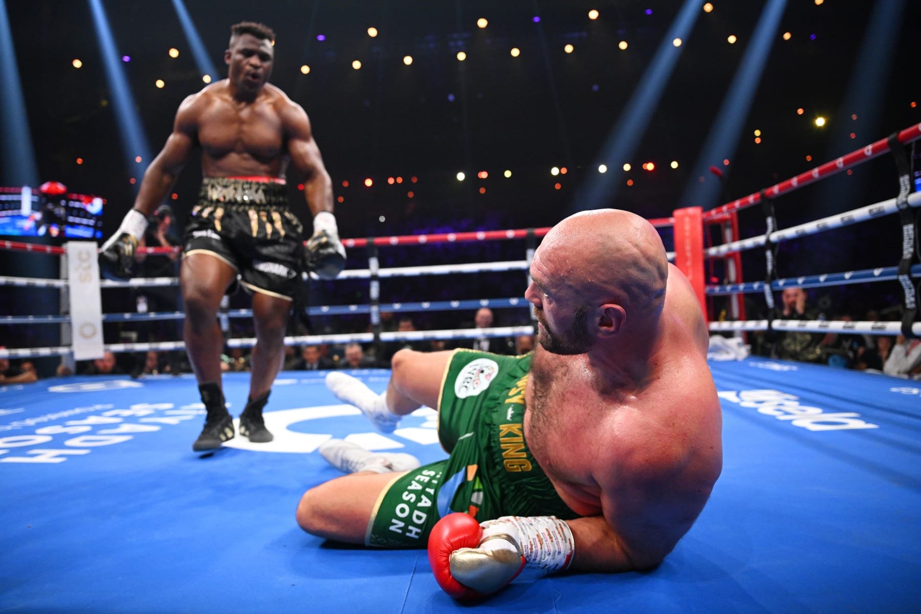 RIYADH, SAUDI ARABIA - OCTOBER 28: Francis Ngannou knocks down Tyson Fury during the Heavyweight fight between Tyson Fury and Francis Ngannou at Boulevard Hall on October 28, 2023 in Riyadh, Saudi Arabia. (Photo by Justin Setterfield/Getty Images)