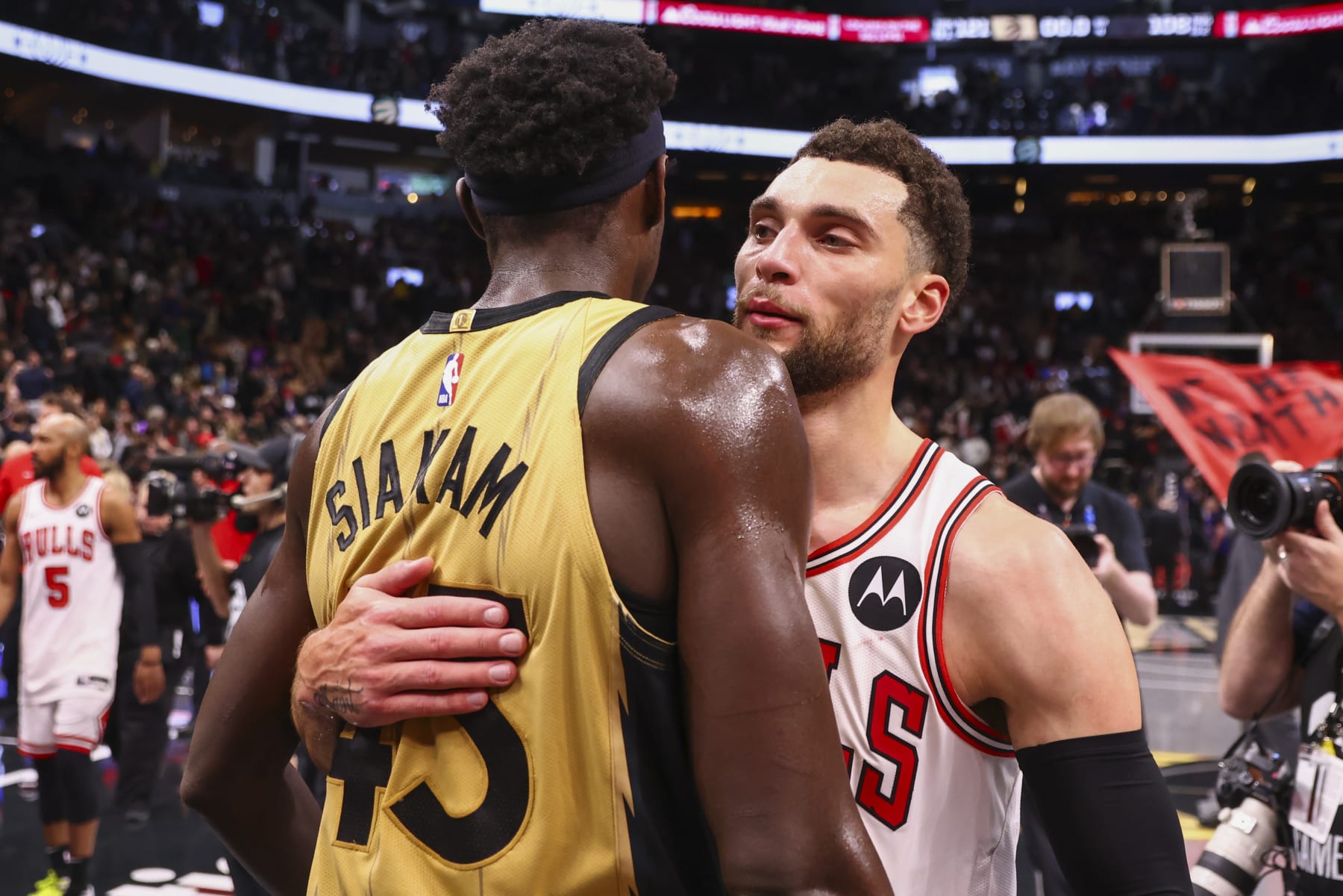 TORONTO, CANADA - NOVEMBER 24: Pascal Siakam #43 of the Toronto Raptors & Zach LaVine #8 of the Chicago Bulls embrace after the game during the In-Season Tournament on November 24, 2023 at the Scotiabank Arena in Toronto, Ontario, Canada. NOTE TO USER: User expressly acknowledges and agrees that, by downloading and or using this Photograph, user is consenting to the terms and conditions of the Getty Images License Agreement. Mandatory Copyright Notice: Copyright 2023 NBAE (Photo by Vaughn Ridley/NBAE via Getty Images)