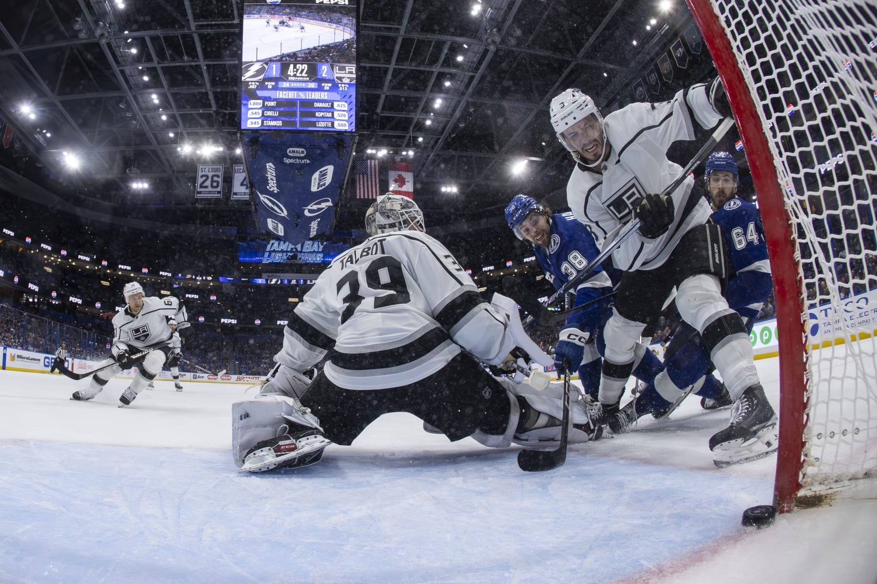 TAMPA, FL - JANUARY 9: Brandon Hagel #38 of the Tampa Bay Lightning scores against goalie Cam Talbot #39 of the Los Angeles Kings during overtime at Amalie Arena on January 9, 2024 in Tampa, Florida. (Photo by Mark LoMoglio/NHLI via Getty Images)