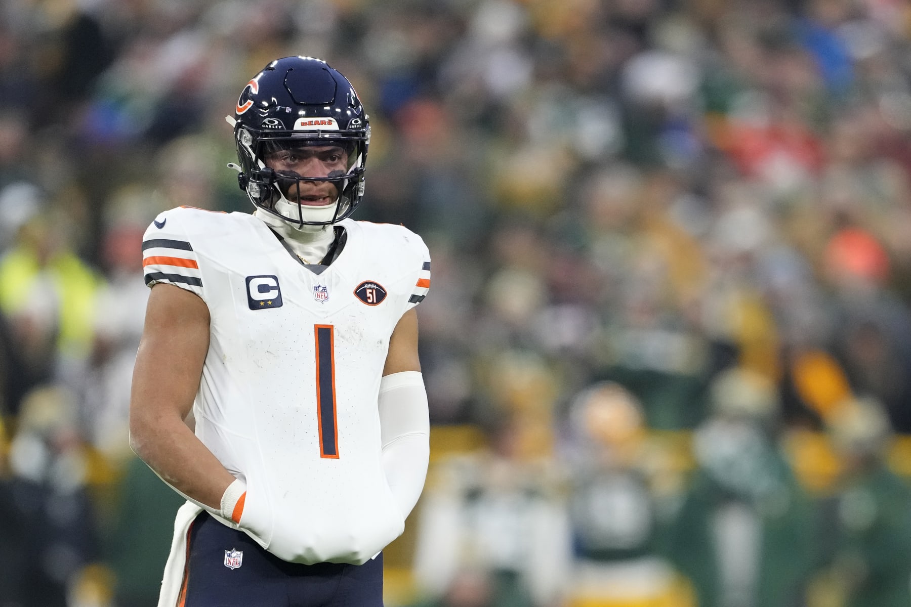 GREEN BAY, WISCONSIN - JANUARY 07: Justin Fields #1 of the Chicago Bears looks on in the first half against the Green Bay Packers at Lambeau Field on January 07, 2024 in Green Bay, Wisconsin. (Photo by Patrick McDermott/Getty Images)