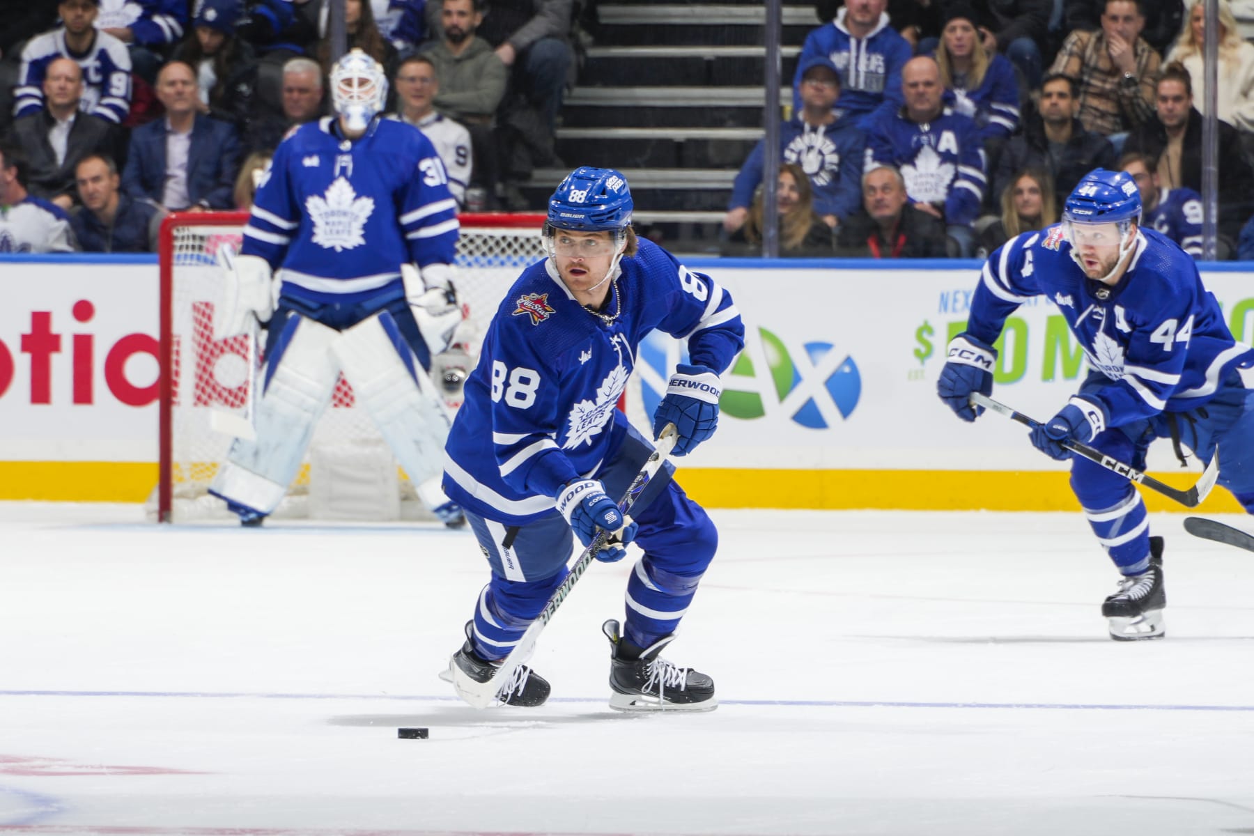 TORONTO, ON - JANUARY 9: William Nylander #88 of the Toronto Maple Leafs plays the puck against the San Jose Sharks during the second period at Scotiabank Arena on January 9, 2024 in Toronto, Ontario, Canada. (Photo by Kevin Sousa/NHLI via Getty Images)