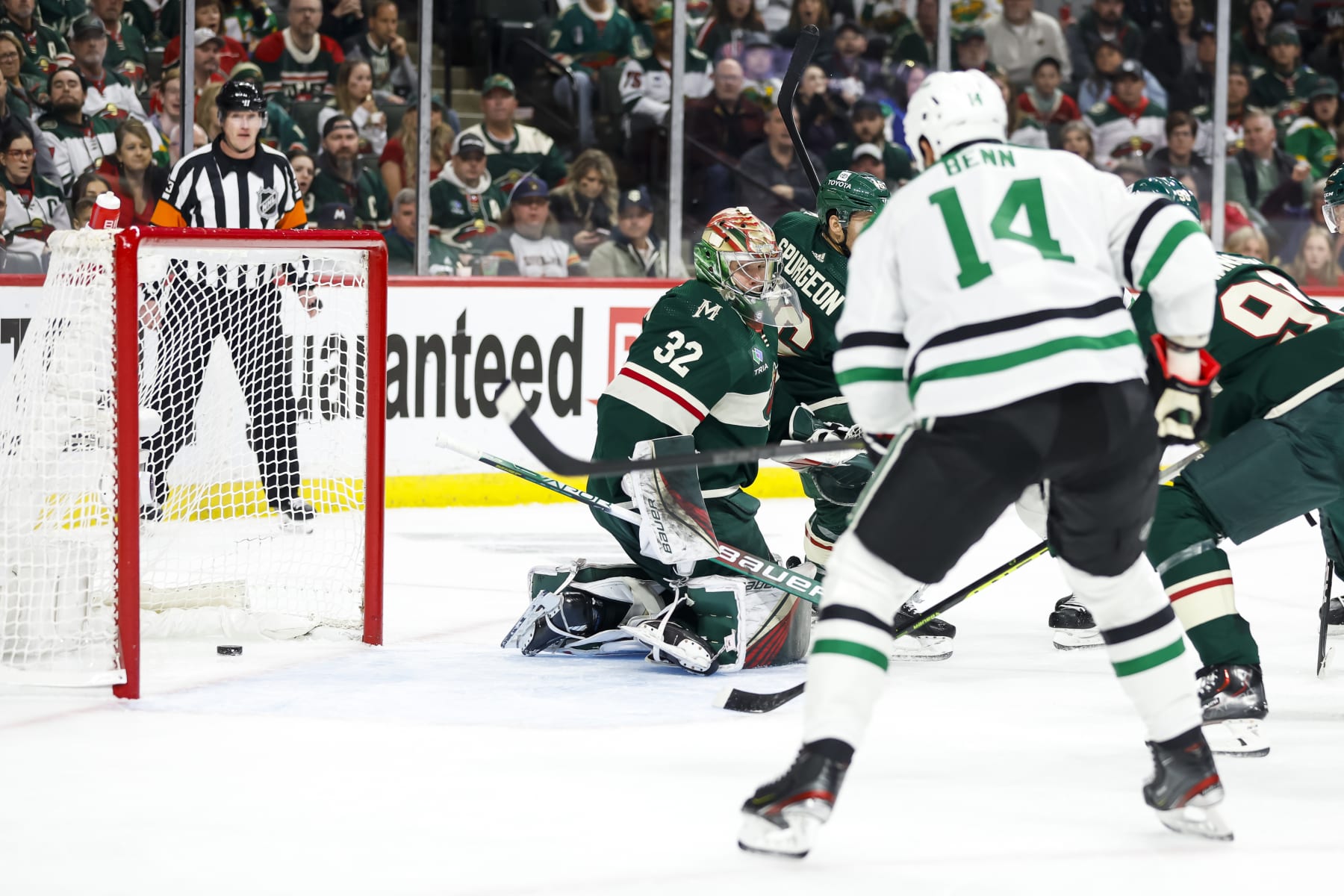 ST PAUL, MN - APRIL 23: A puck shot by Tyler Seguin #91 of the Dallas Stars goes past Filip Gustavsson #32 of the Minnesota Wild for a power-play goal in the second period of Game Four of the First Round of the 2023 Stanley Cup Playoffs at Xcel Energy Center on April 23, 2023 in St Paul, Minnesota. (Photo by David Berding/Getty Images)