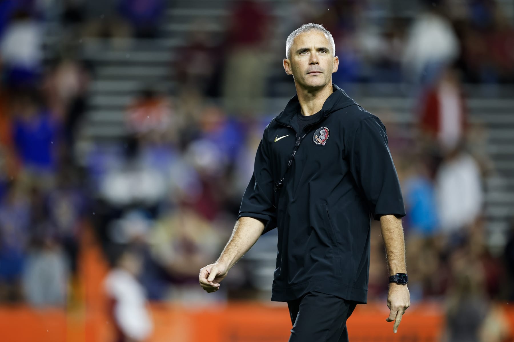 GAINESVILLE, FLORIDA - NOVEMBER 25: Head coach Mike Norvell of the Florida State Seminoles looks on before the start of a game against the Florida Gators at Ben Hill Griffin Stadium on November 25, 2023 in Gainesville, Florida. (Photo by James Gilbert/Getty Images)