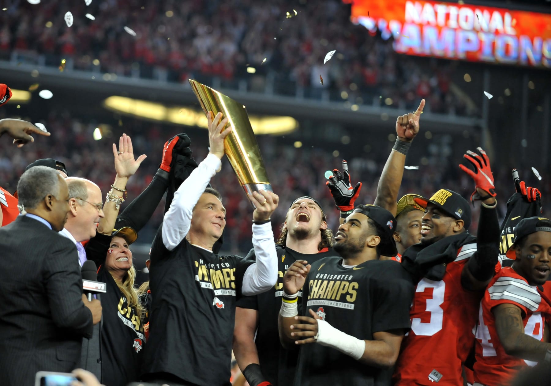 January 12, 2015: Ohio State Buckeyes Head Coach Urban Meyer holding the national championship trophy after the win during the Ohio State Buckeyes game versus the Oregon Ducks in the College Football Playoff National Championship at AT&T Stadium in Arlington, TX. Ohio State wins against Oregon, 42-20. (Photo by Patrick Green/Icon Sportswire/Corbis/Icon Sportswire via Getty Images)