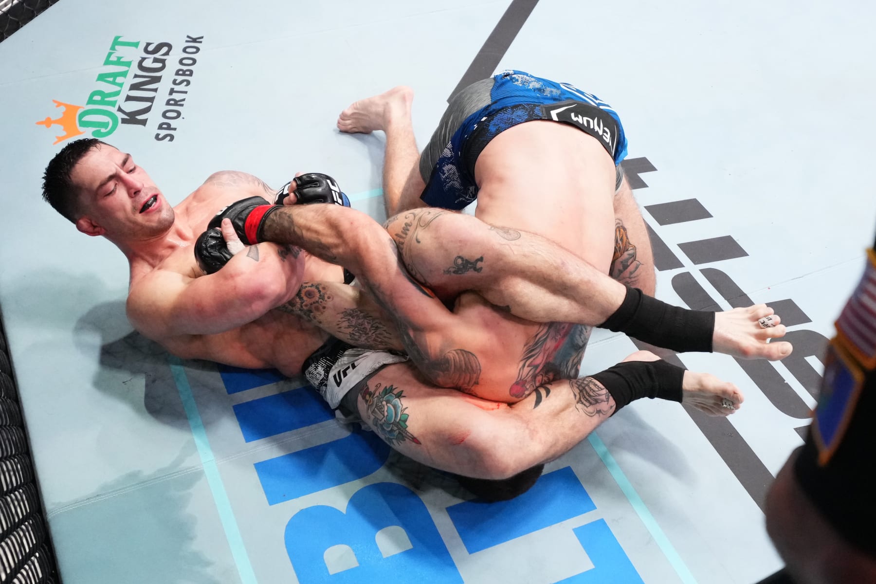 LAS VEGAS, NEVADA - JANUARY 13: (L-R) Preston Parsons works for a submission against Matthew Semelsberger in a welterweight fight during the UFC Fight Night event at UFC APEX on January 13, 2024 in Las Vegas, Nevada. (Photo by Chris Unger/Zuffa LLC via Getty Images)