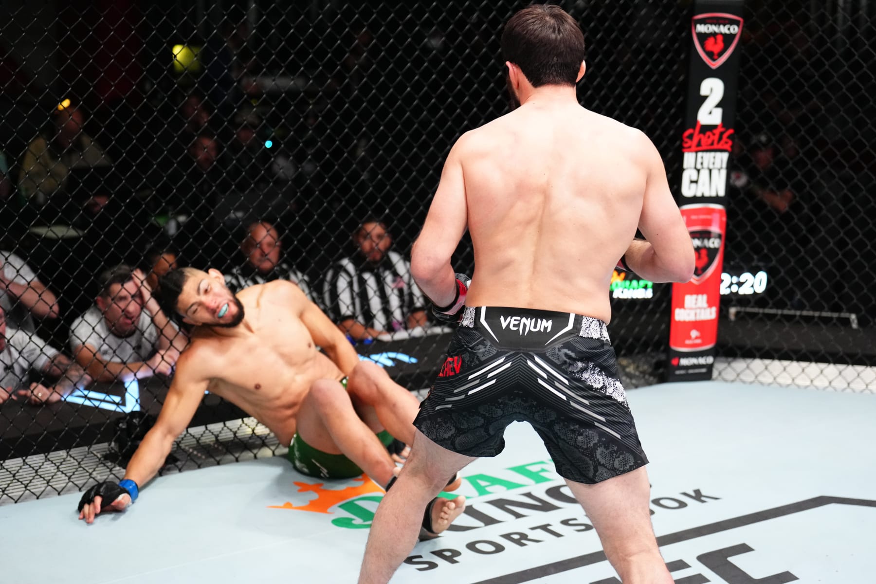 LAS VEGAS, NEVADA - JANUARY 13: (R-L) Magomed Ankalaev of Russia knocks out Johnny Walker of Brazil in a light heavyweight fight during the UFC Fight Night event at UFC APEX on January 13, 2024 in Las Vegas, Nevada. (Photo by Chris Unger/Zuffa LLC via Getty Images)